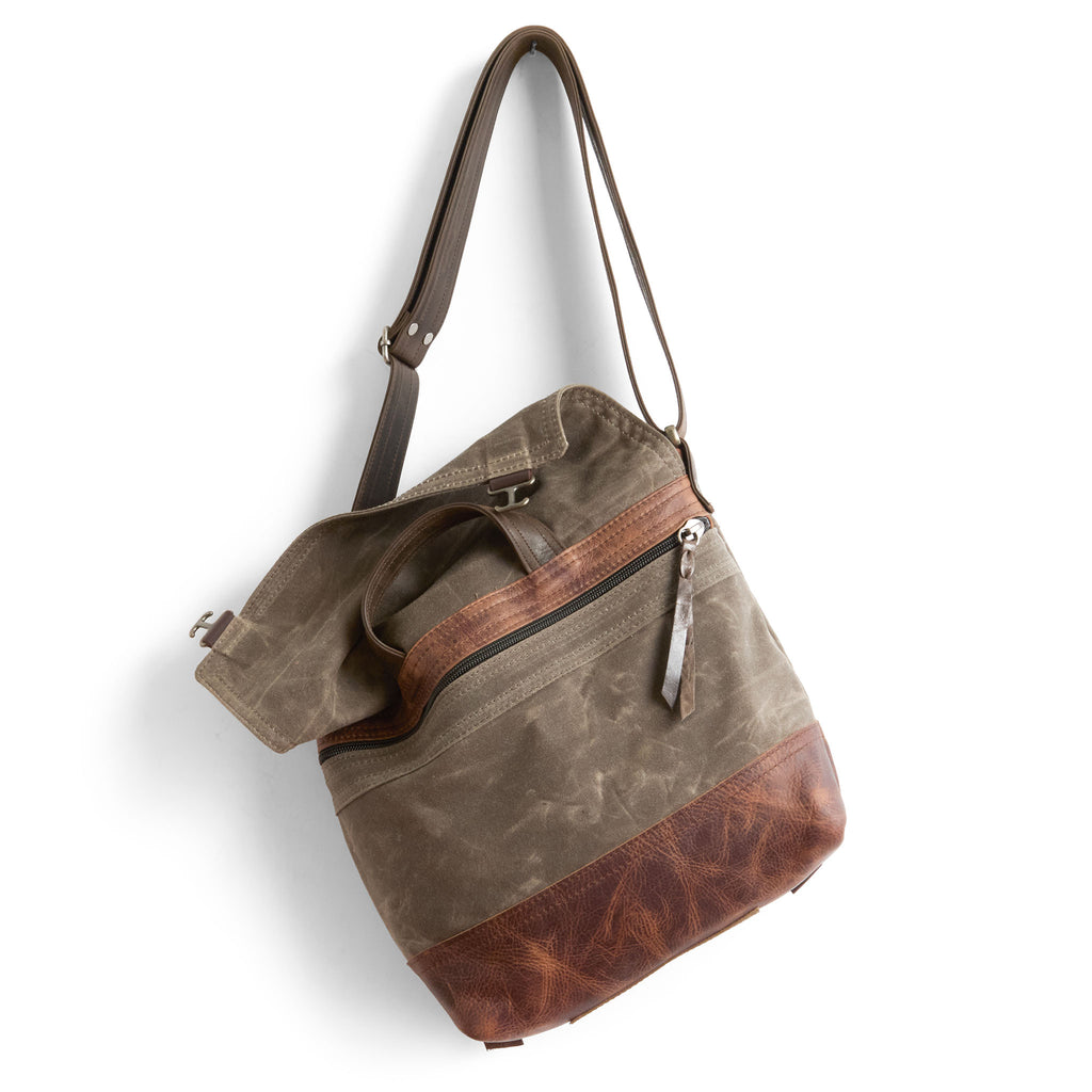 1909 small in dark oak canvas and fuentes base showcasing back zippered pocket