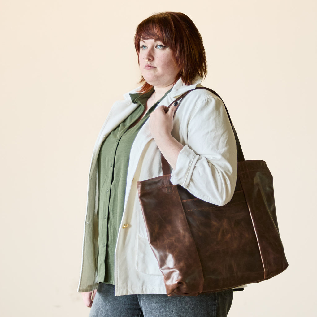 model holding scarborough in bourbon and cognac