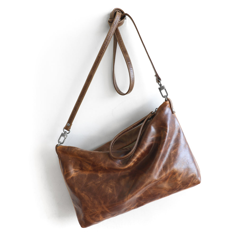traveler crossbody in selkie and vintage brown