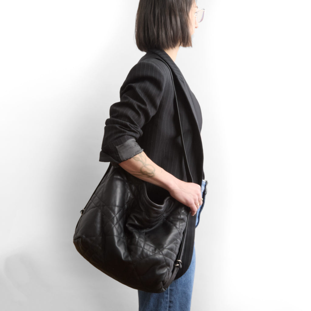 boho e+w size large in quilted pashi black being modeled in shoulder setting