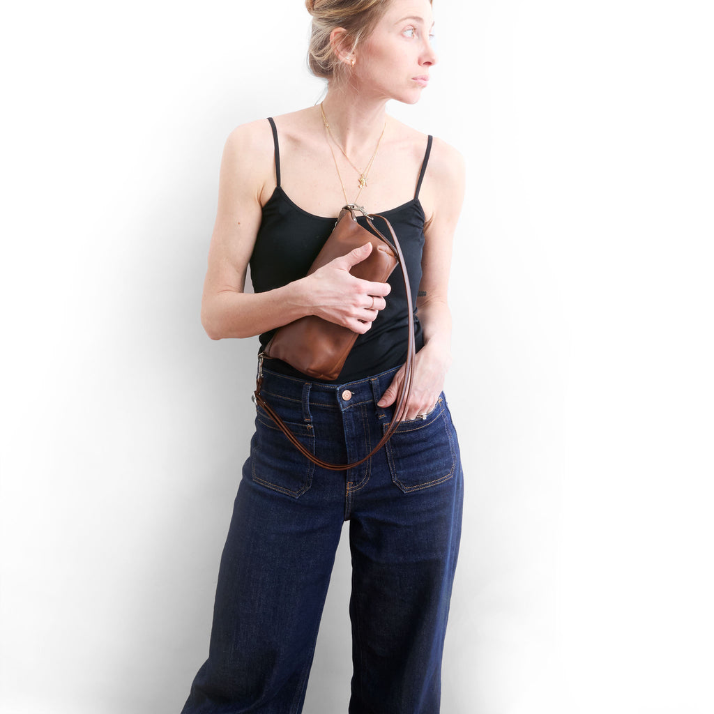 model holding the wren in pure saddle