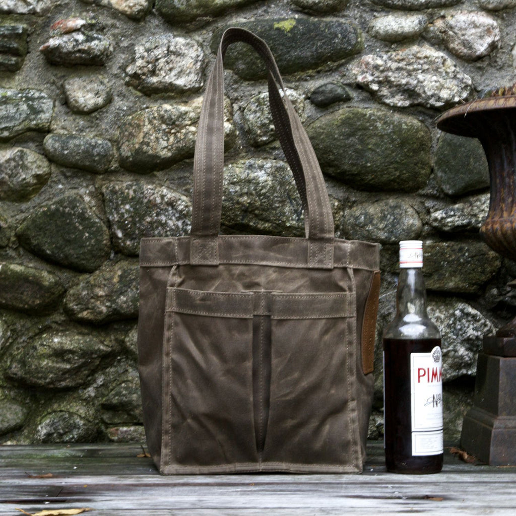 treki small in dark oak waxed canvas