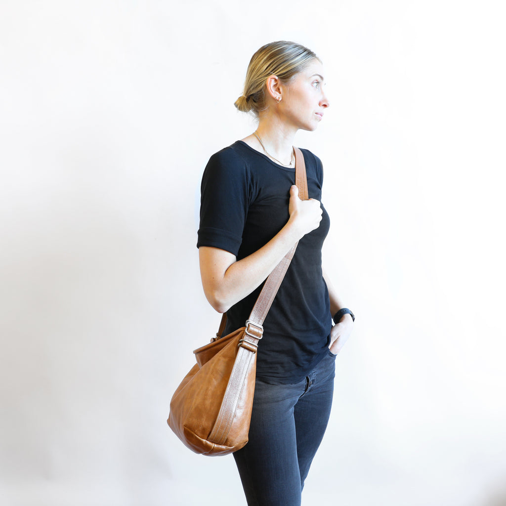 model with boho e+w adjustable size medium in light saddle