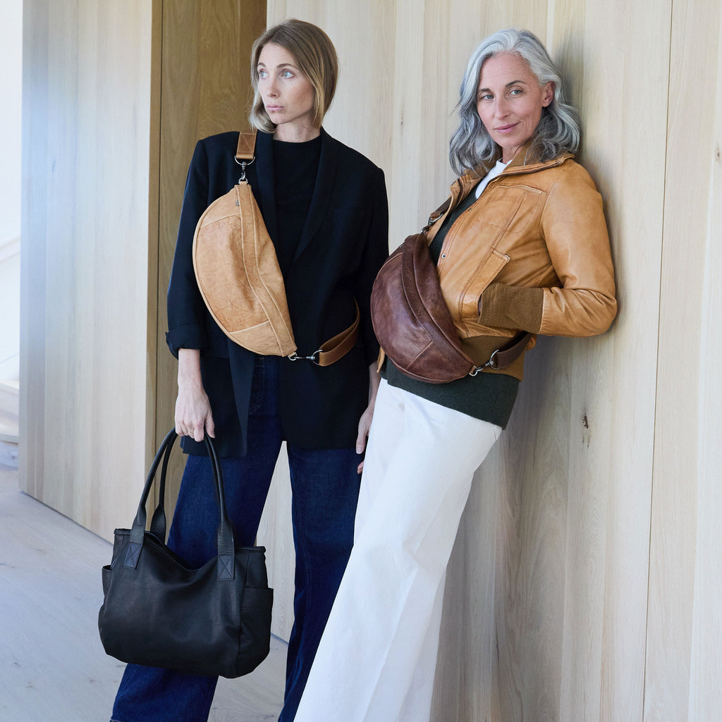 model on left wearing the lissa in flight vachetta, model on right wearing the lissa in fuentes 