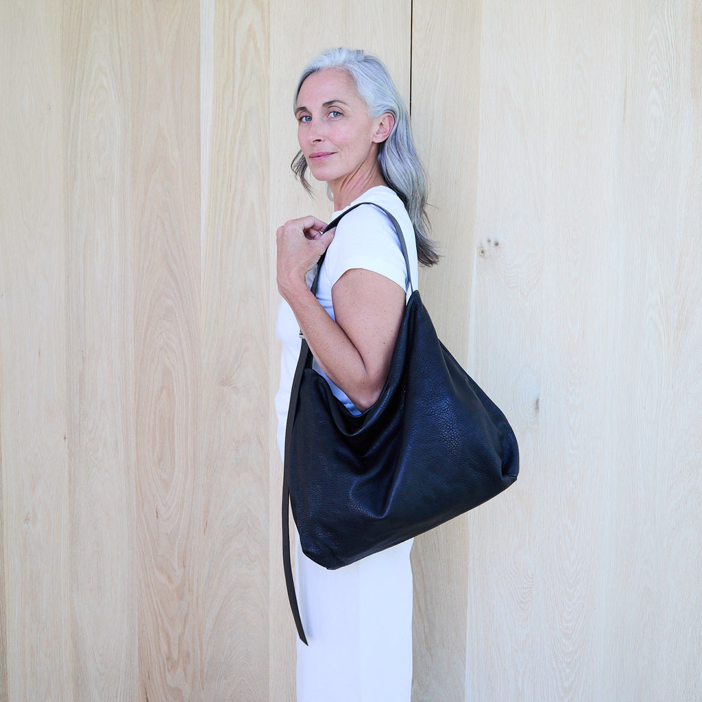 model wearing a central boho in shoulder setting 