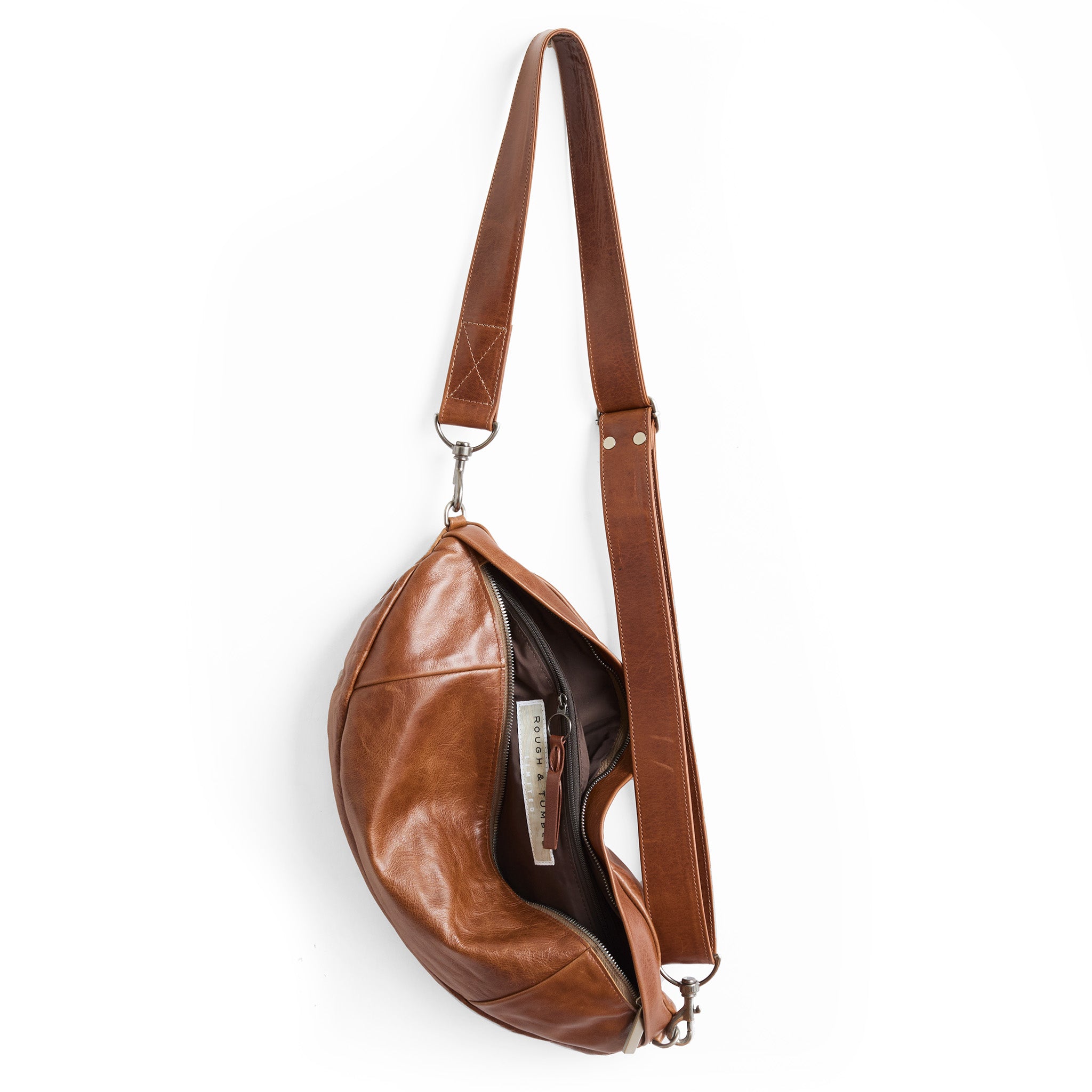 lissa in saddle, showcasing interior cocoa lining