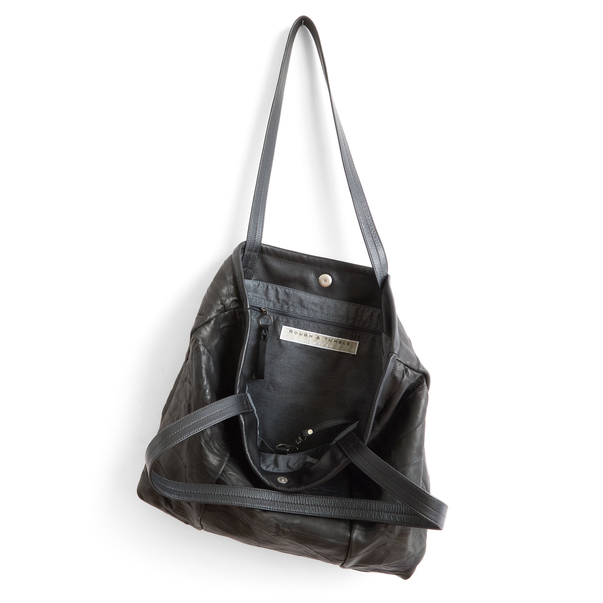 asher large in milano black, showcasing interior grey chambray lining and zippered pocket