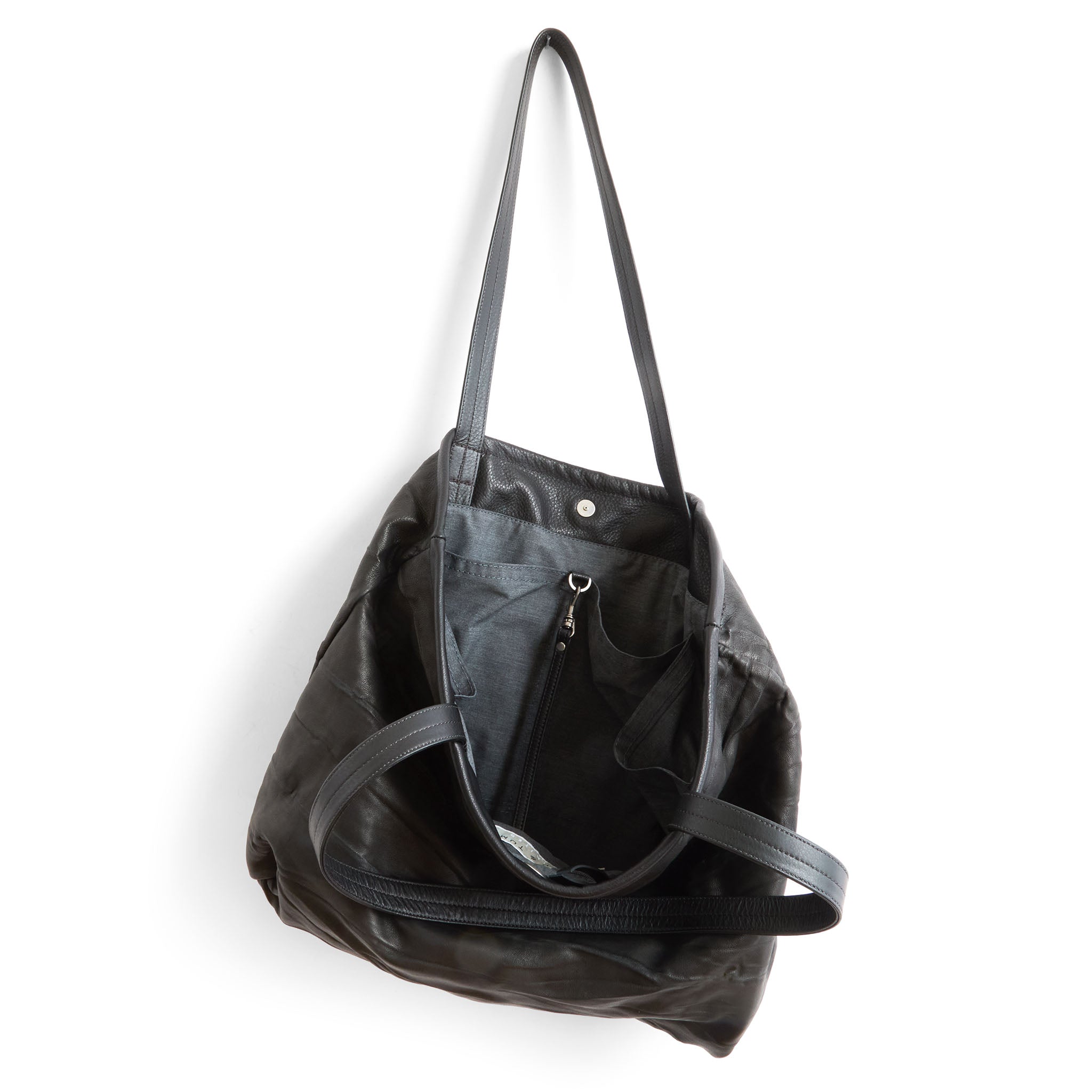 asher large in milano black, showcasing interior grey chambray lining and open pockets