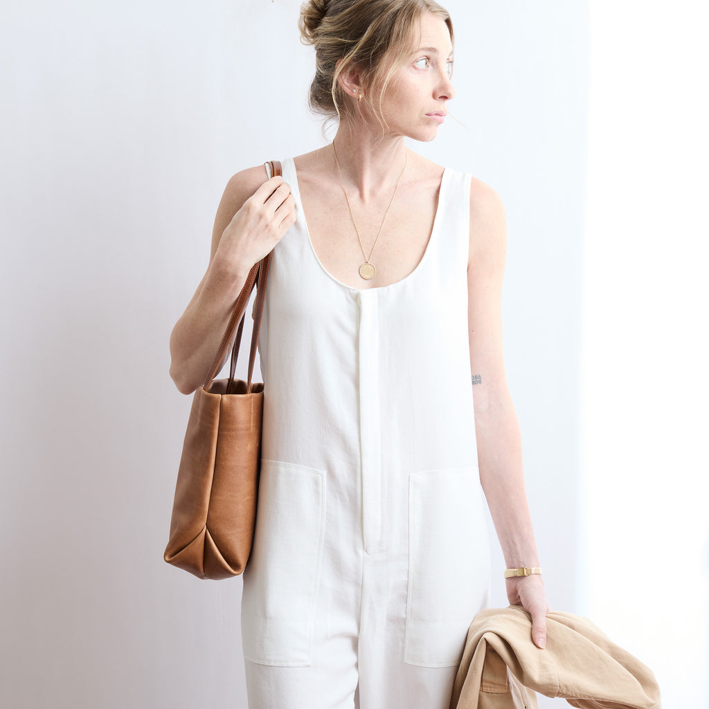 model wearing ballet tote on her shoulder 