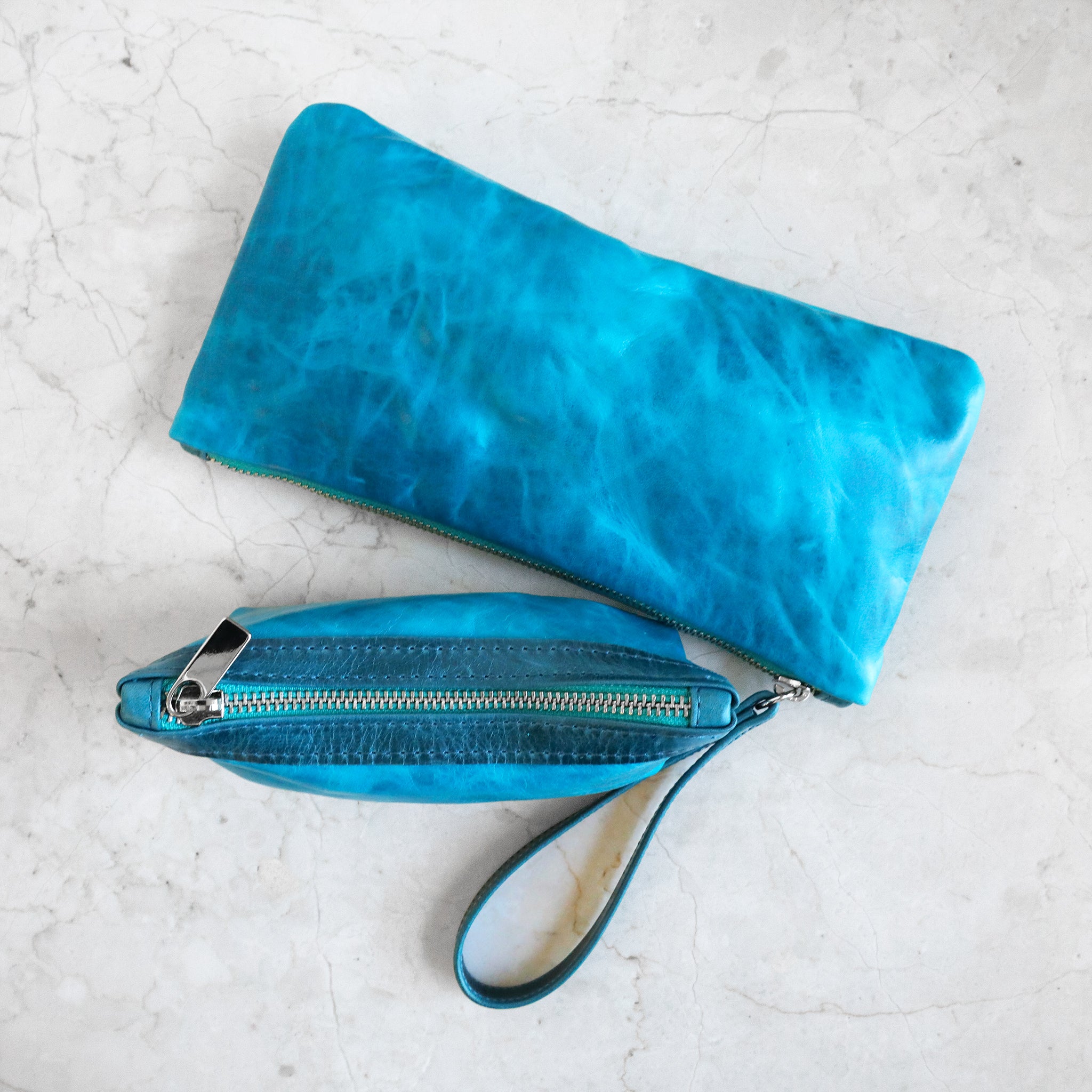 clutch with zip pouch small in martinique and tourmaline with nickel hardware