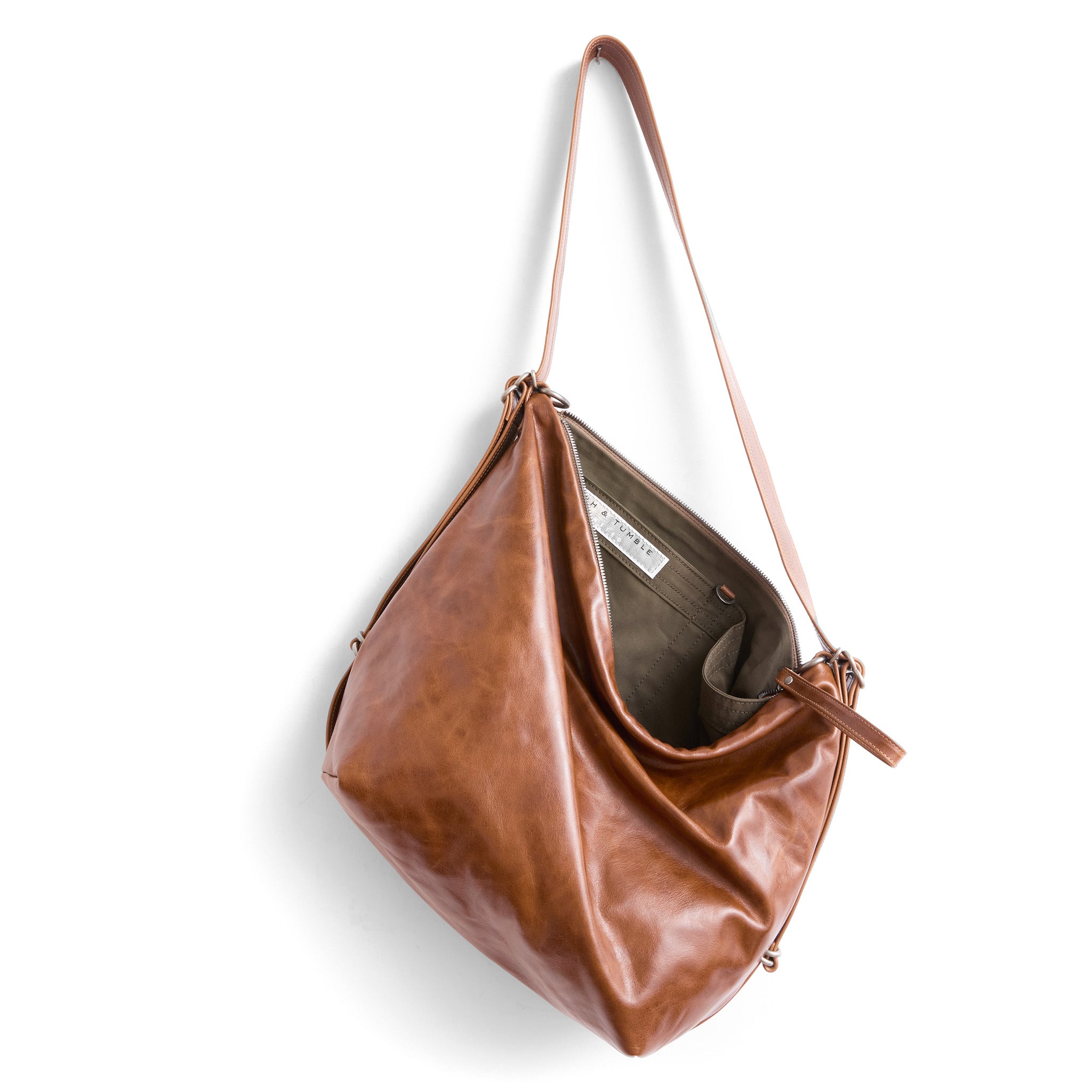 hobo pack size large in saddle, showcasing kelp interior lining