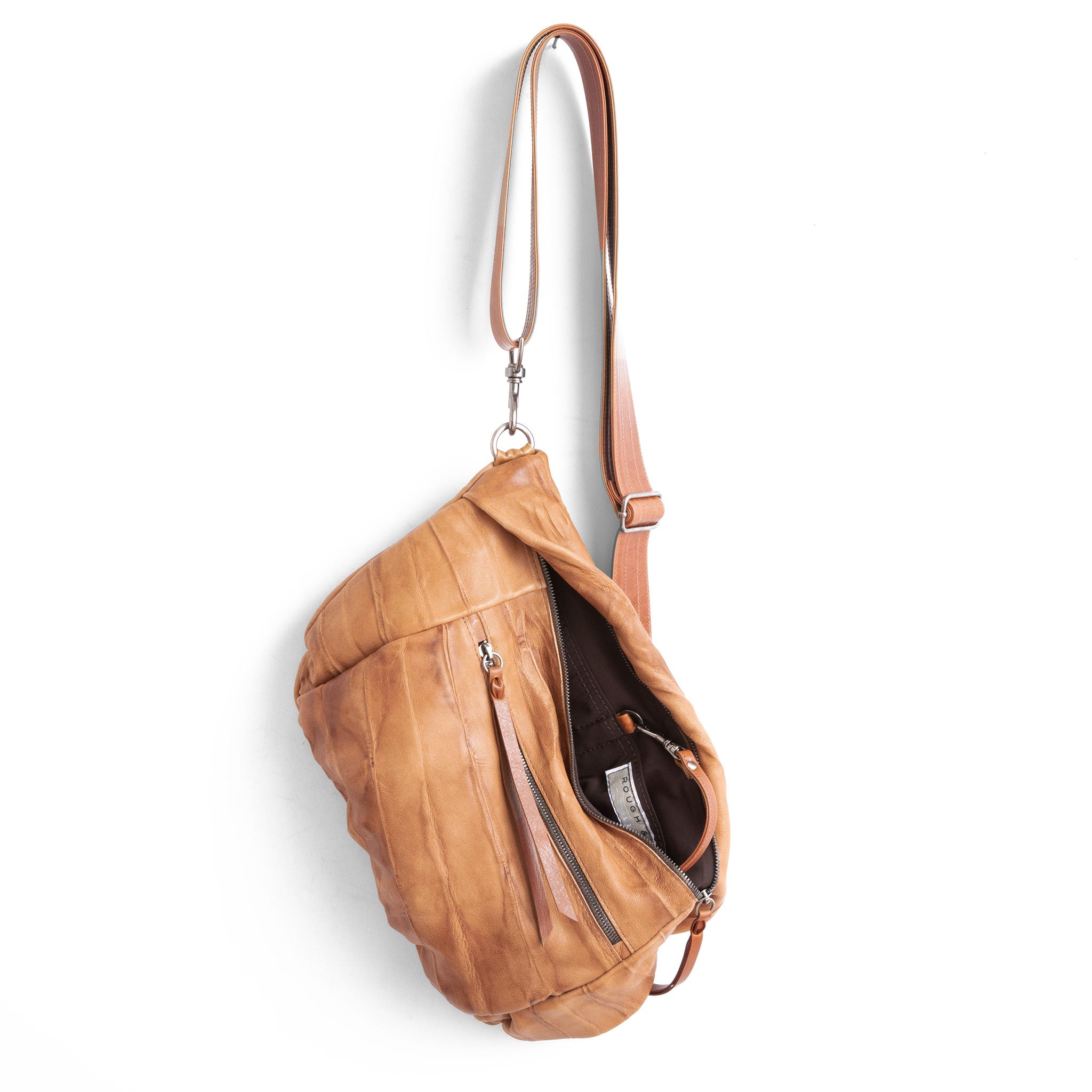 jenny size large in milano saddle, showcasing interior cocoa lining