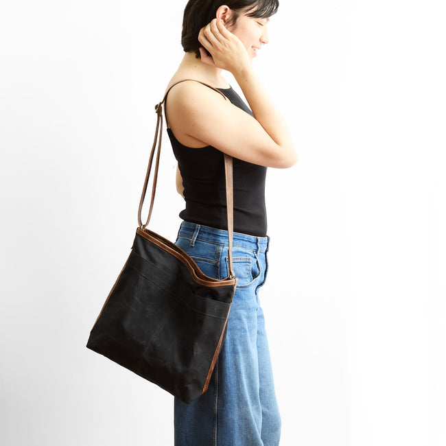 black waxed canvas + vintage brown | the lerret in black waxed canvas