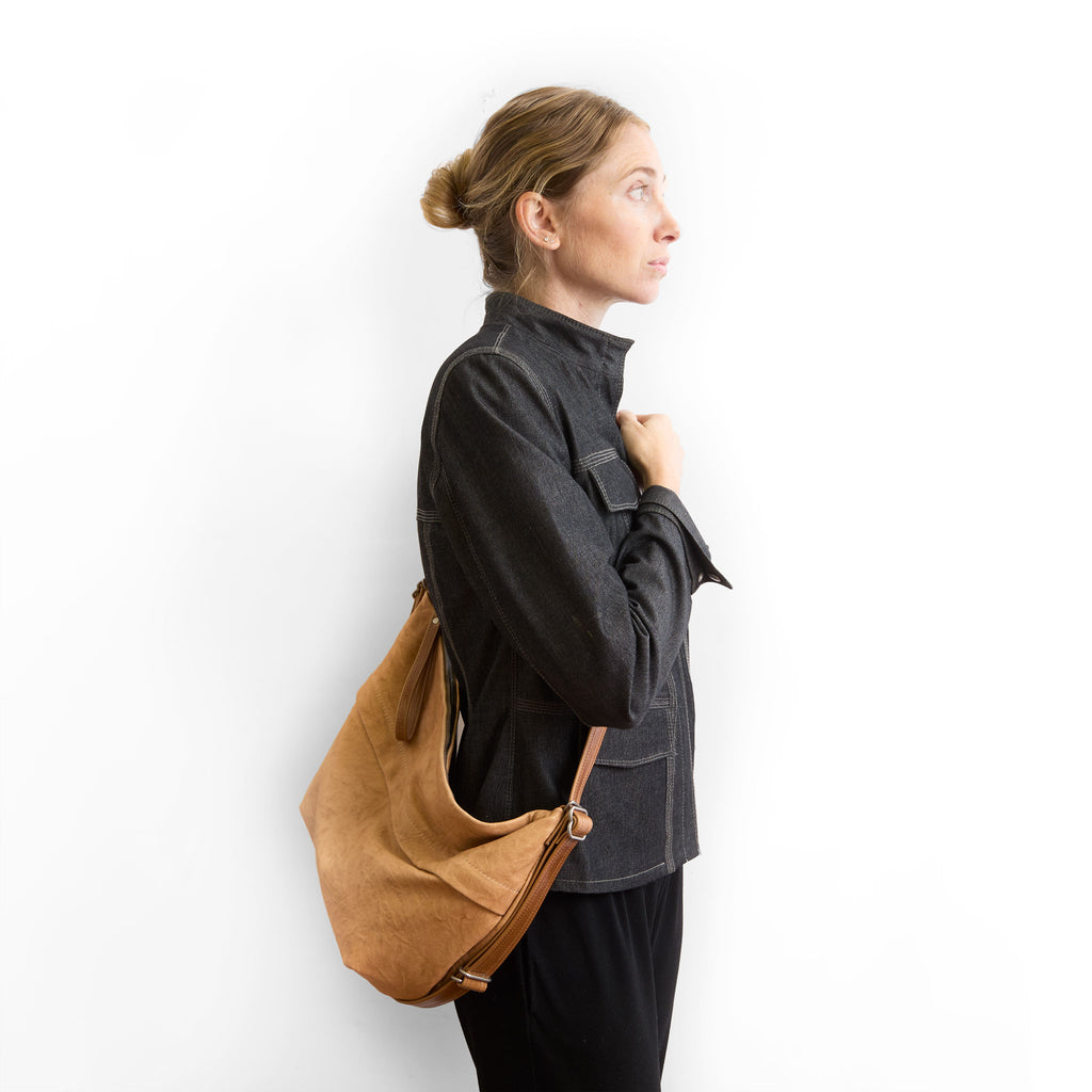 duffel single zip worn as crossbody 