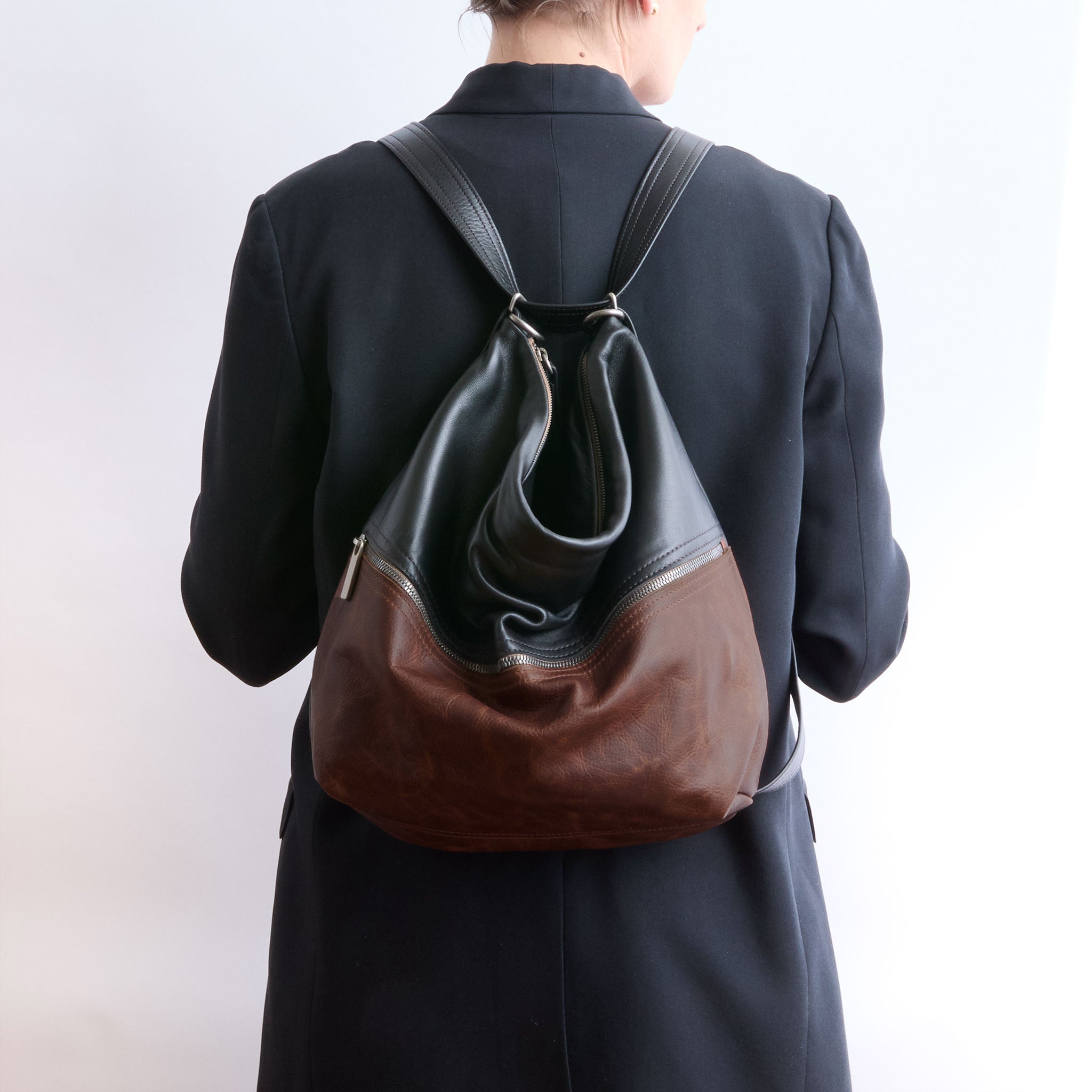 large city in fuentes and plonge back, being worn in backpack setting