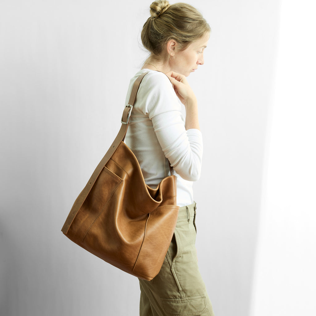 model with large central lotus in premium saddle 