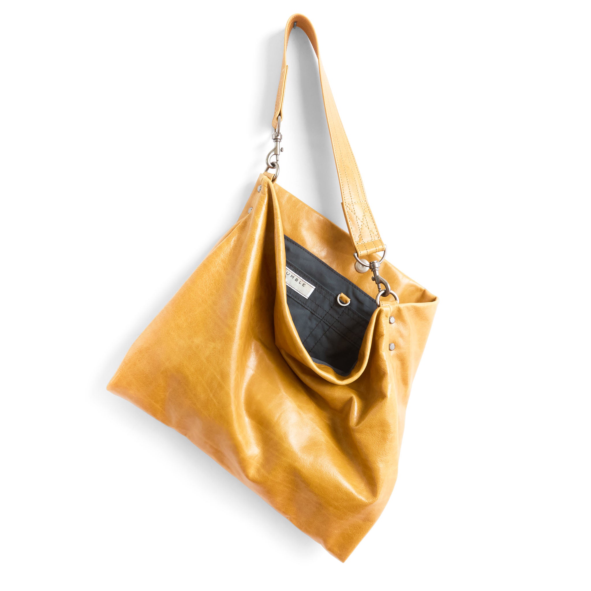 olivia size medium in goldenrod, showcasing interior core grey lining