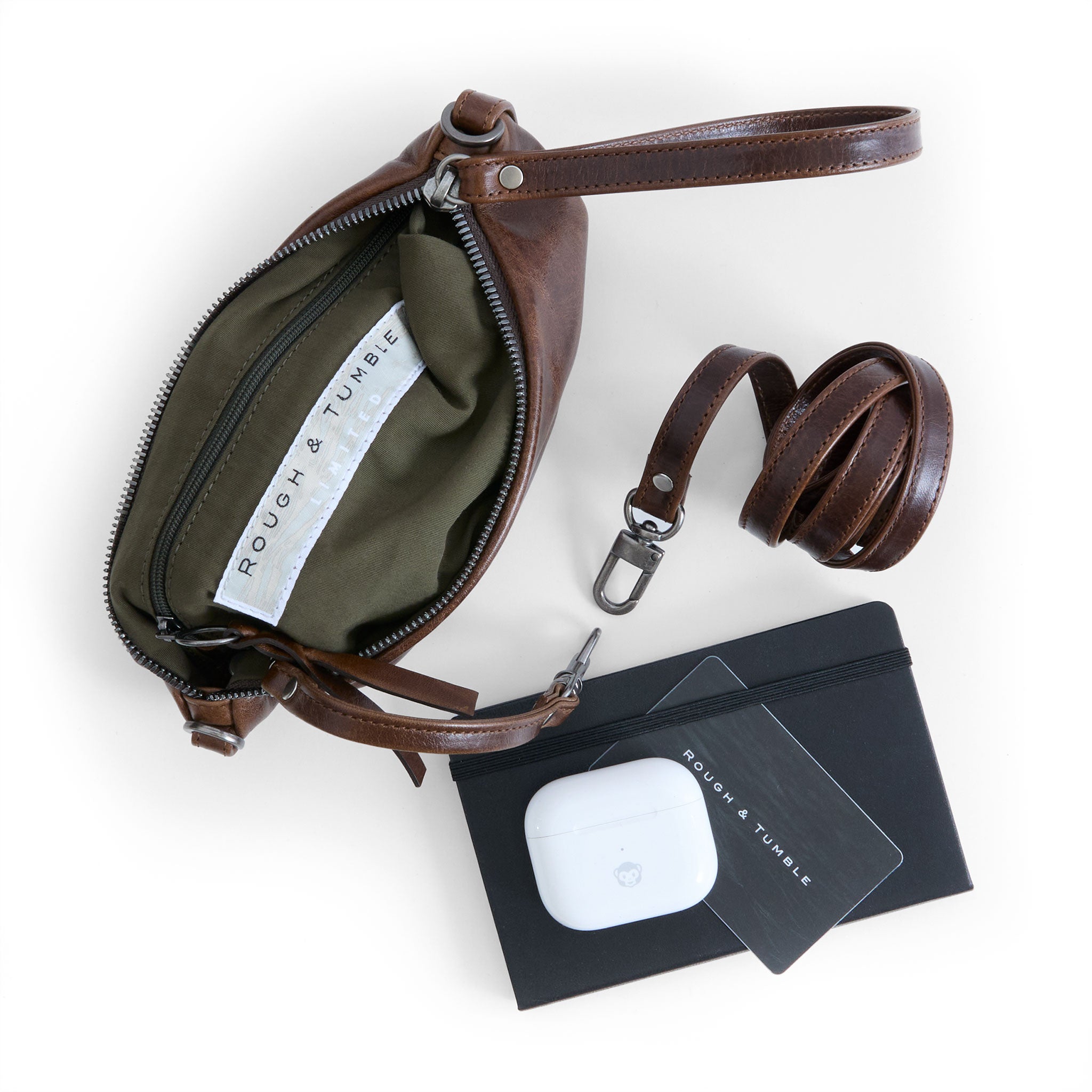 small pinched bottom traveler in cognac, showcasing interior kelp lining