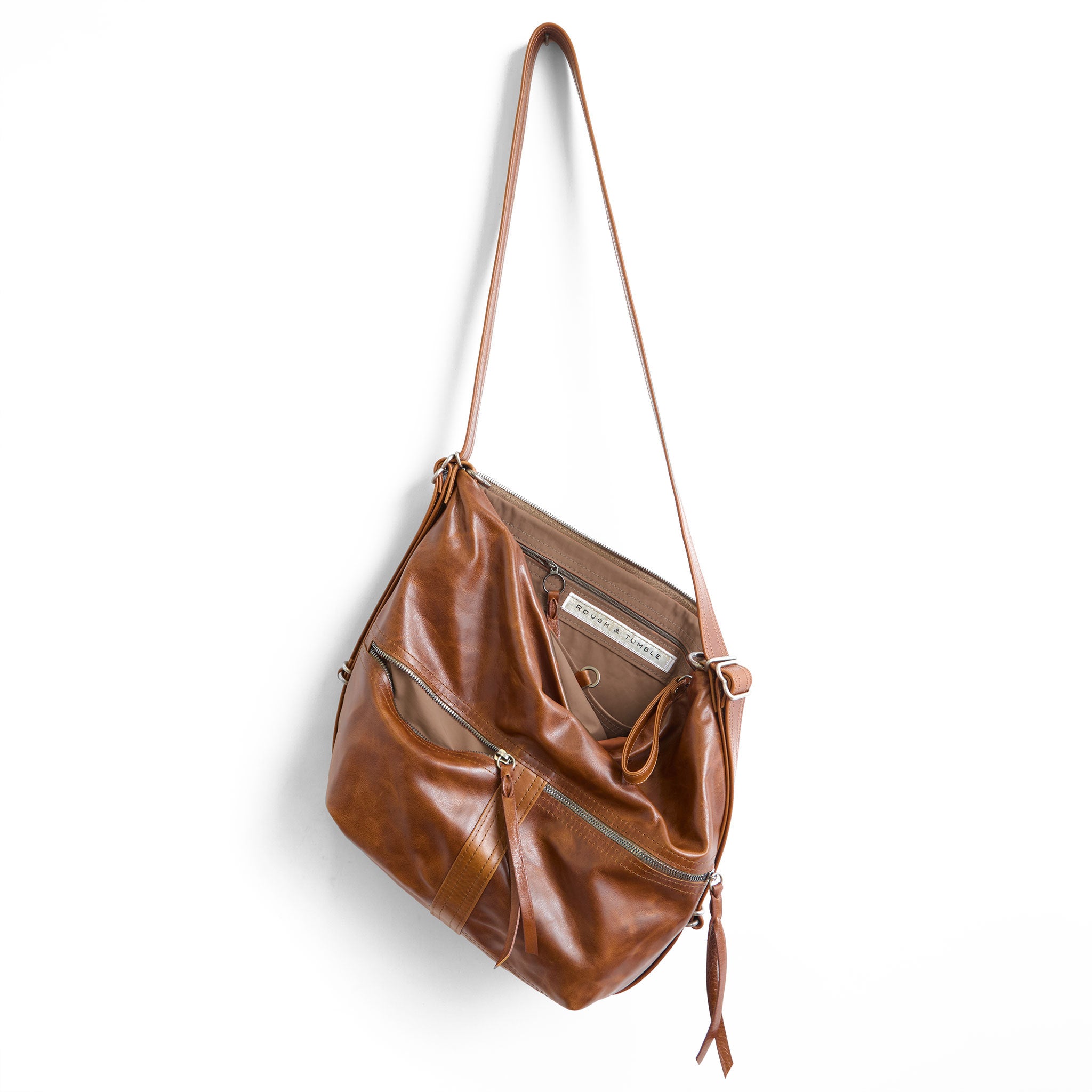 city safari medium in saddle, showcasing interior nutmeg lining