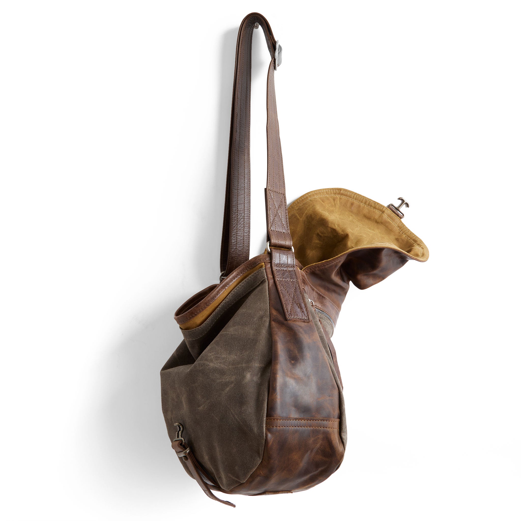 1903 large in rustic pecan leather base + flap + sides and dark oak waxed canvas front panel