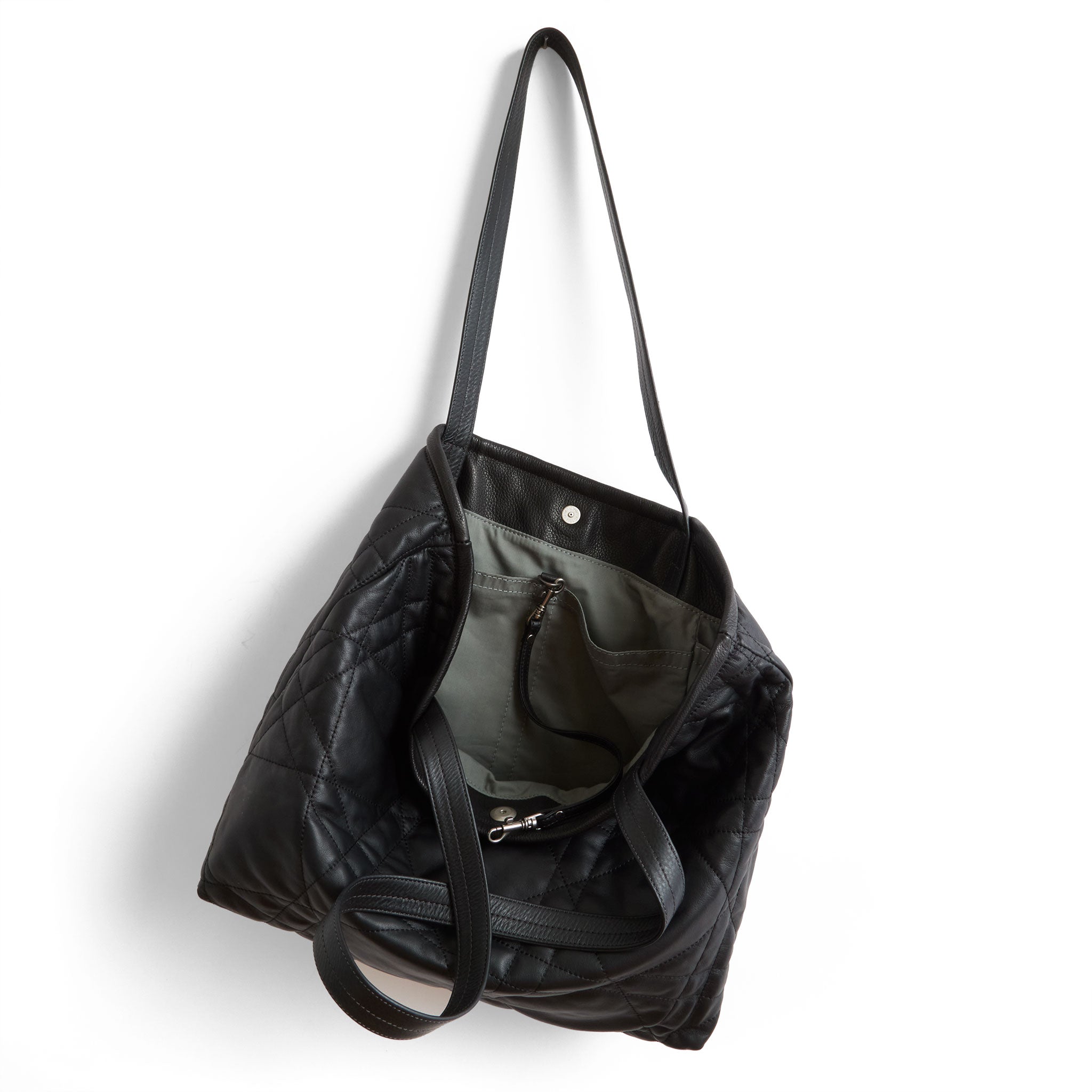 asher size large in quilted pashi black, showcasing interior cinder lining and open pockets