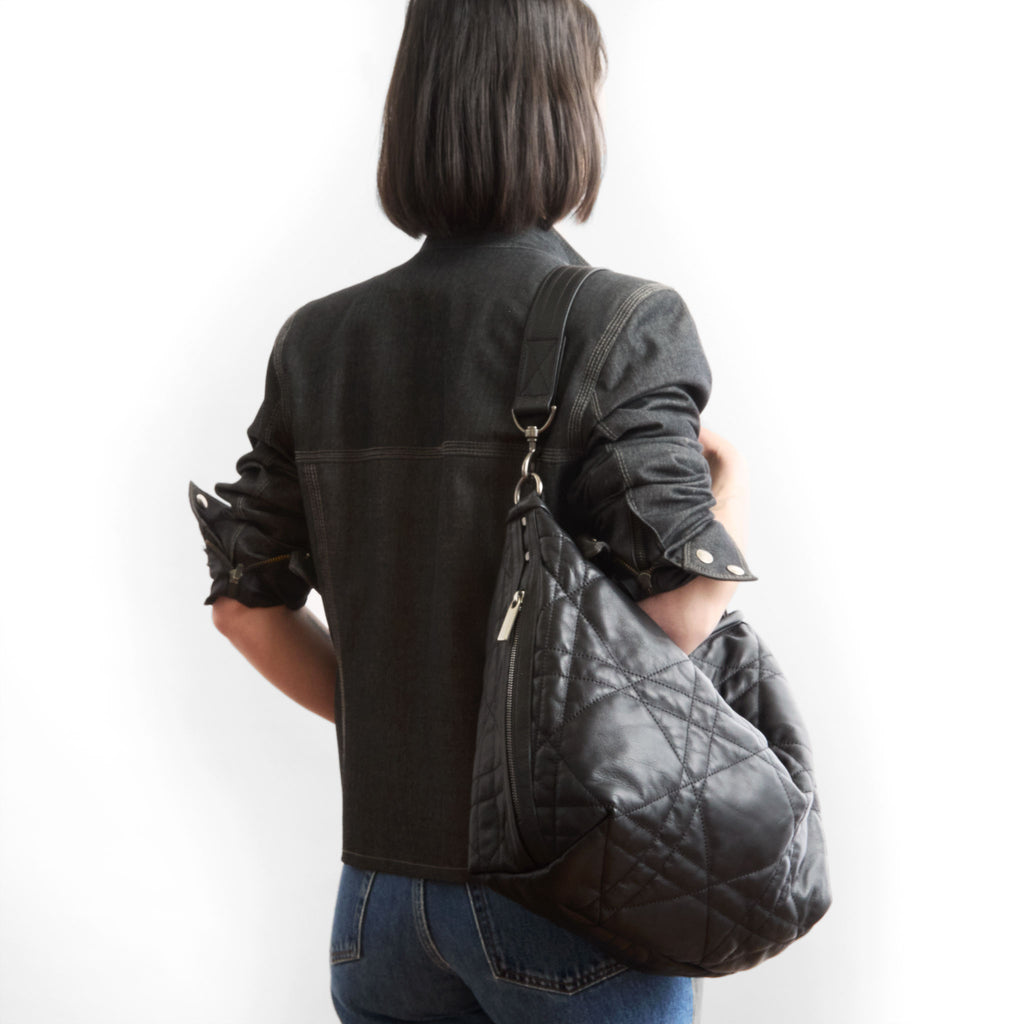 model wearing the boho e+w dz in quilted pashi black, size large 