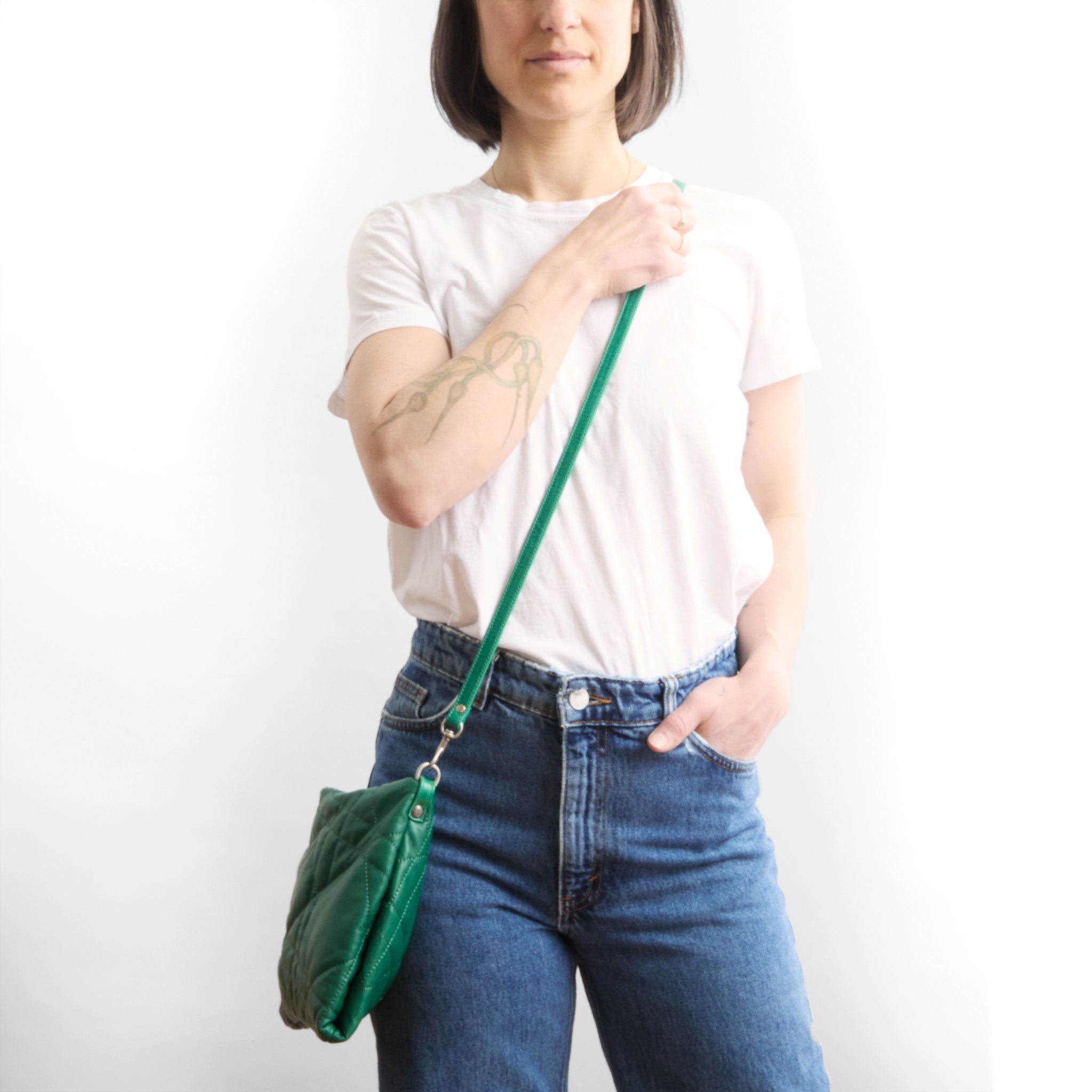 model wearing the covet in quilted pashi emerald