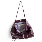 aubergine | brooklyn tote in aubergine showcasing interior lupine lining