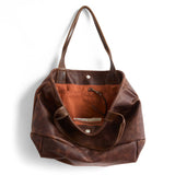 fuentes + cognac | cape asher in fuentes, showcasing interior cider lining and open pockets