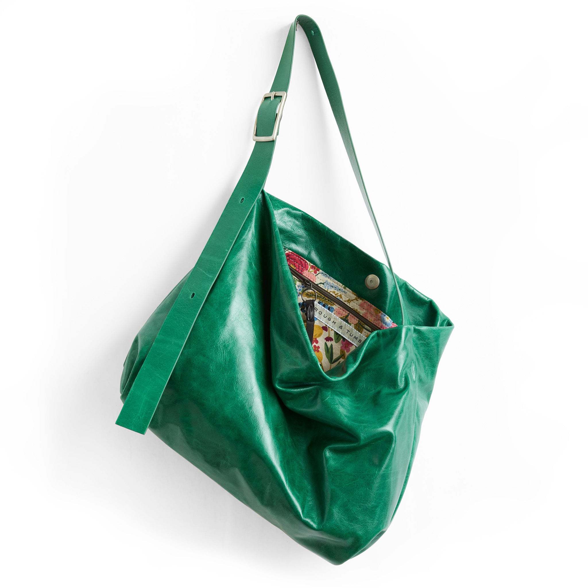 large central boho in emerald, showcasing interior rifle co garden party coral lining