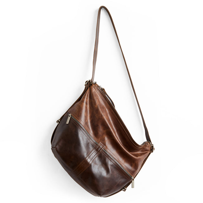 bourbon + selkie | city safari double zip size medium in bourbon, on base, and selkie on top.