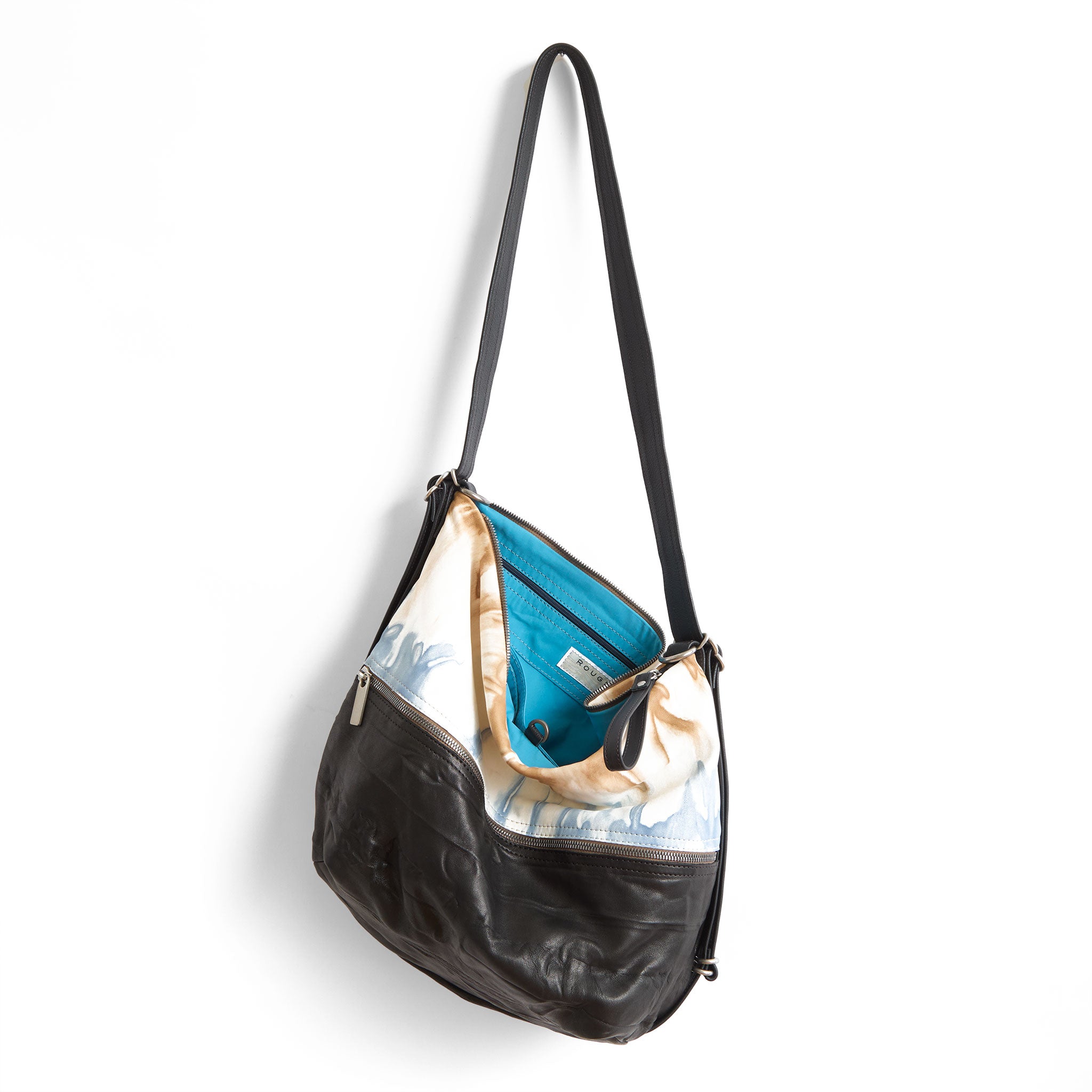 city safari size medium in blue canyon lamb and milano black base, showcasing interior robin blue lining