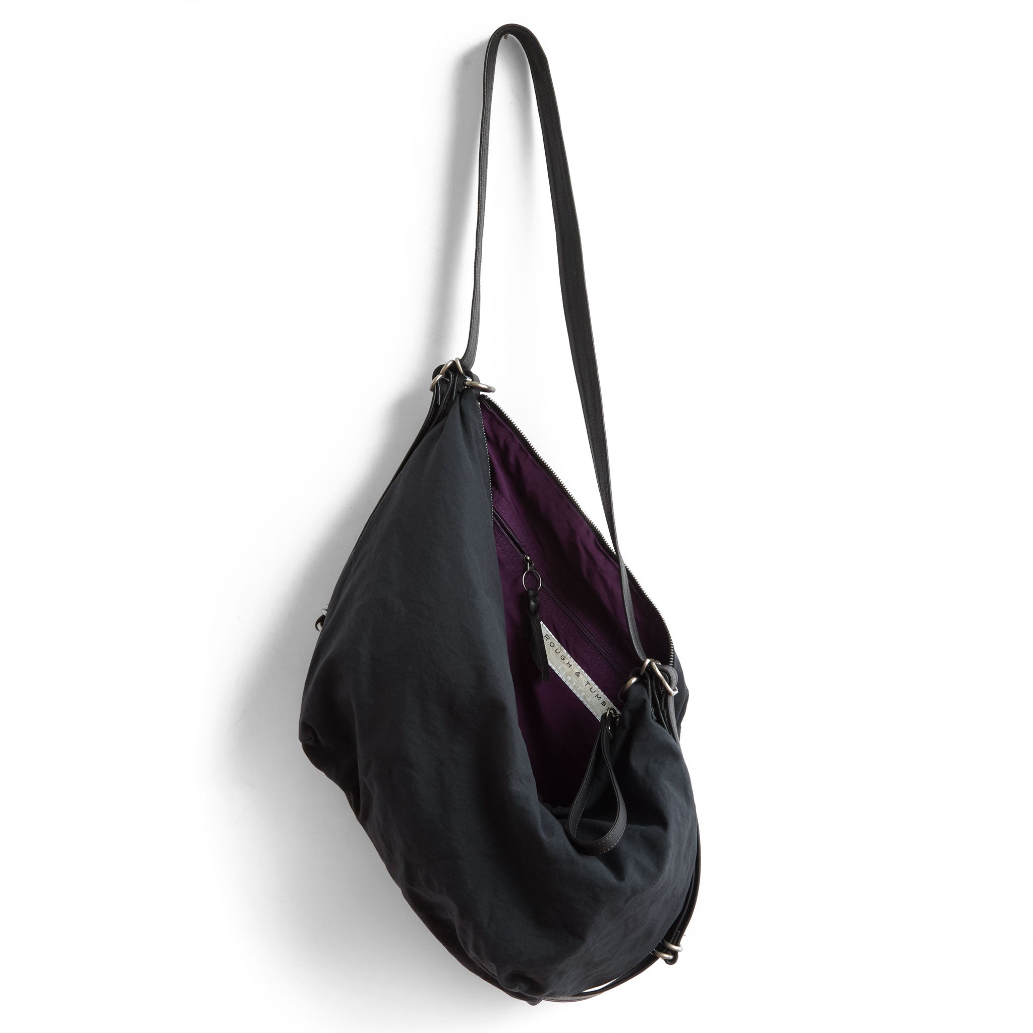 duffel size large in matte black japanese textured canvas, showcasing interior purple lining