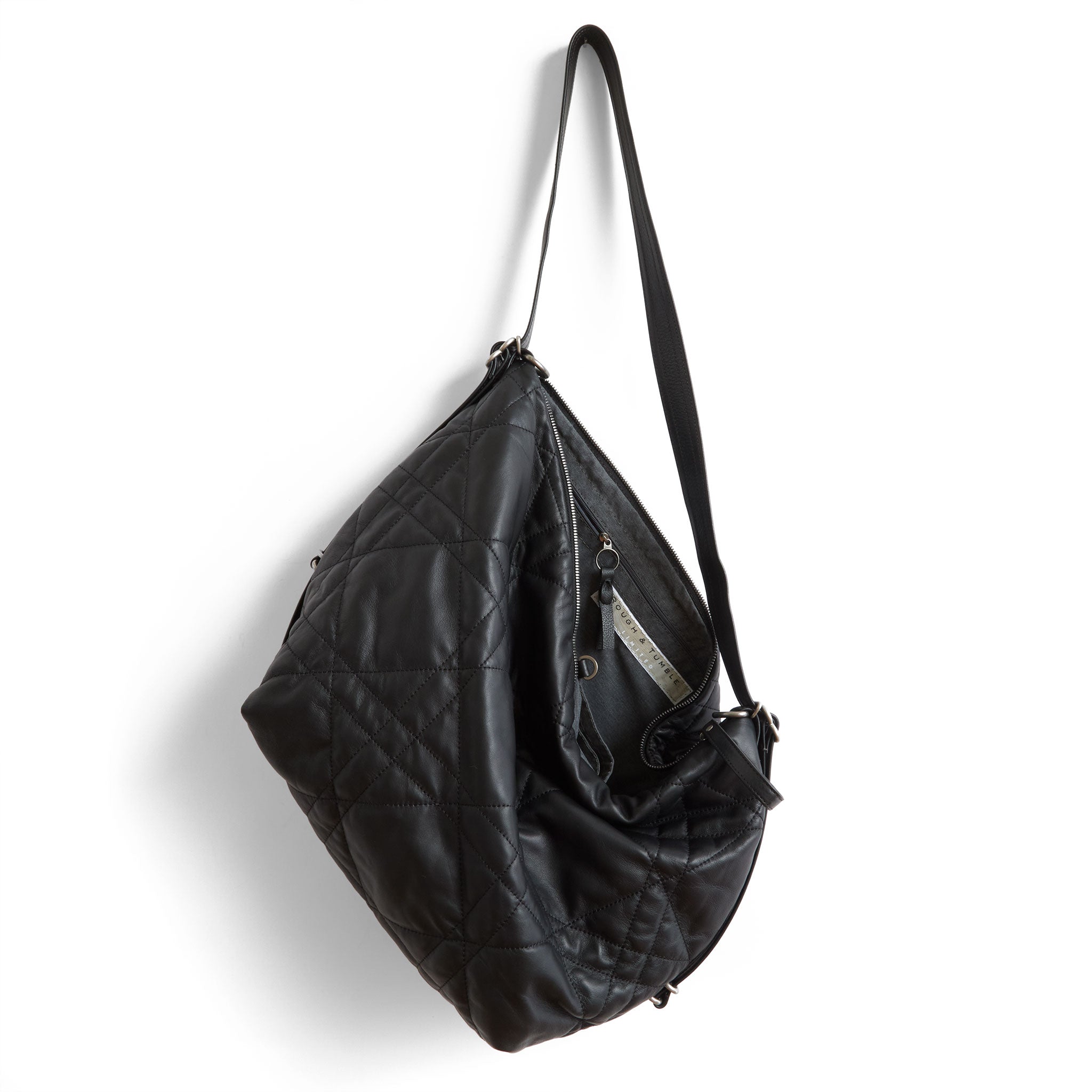 duffel size large in quilted pashi black, showcasing interior grey chambray lining and zippered pocket