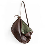 bourbon + cognac | medium duffel in bourbon, showcasing interior acadia lining