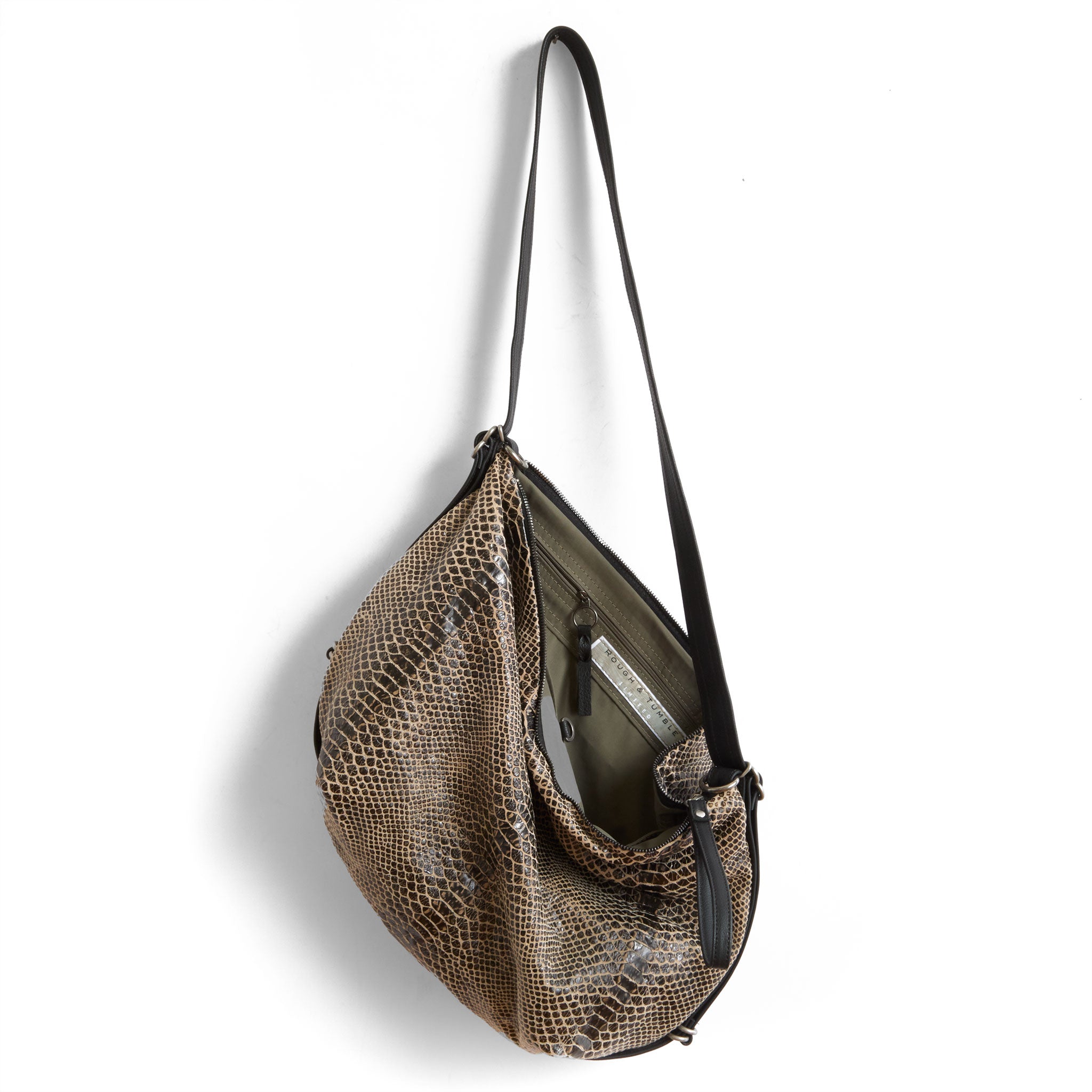 duffel size medium in destroyed snake, showcasing interior essex lining and zippered pocket