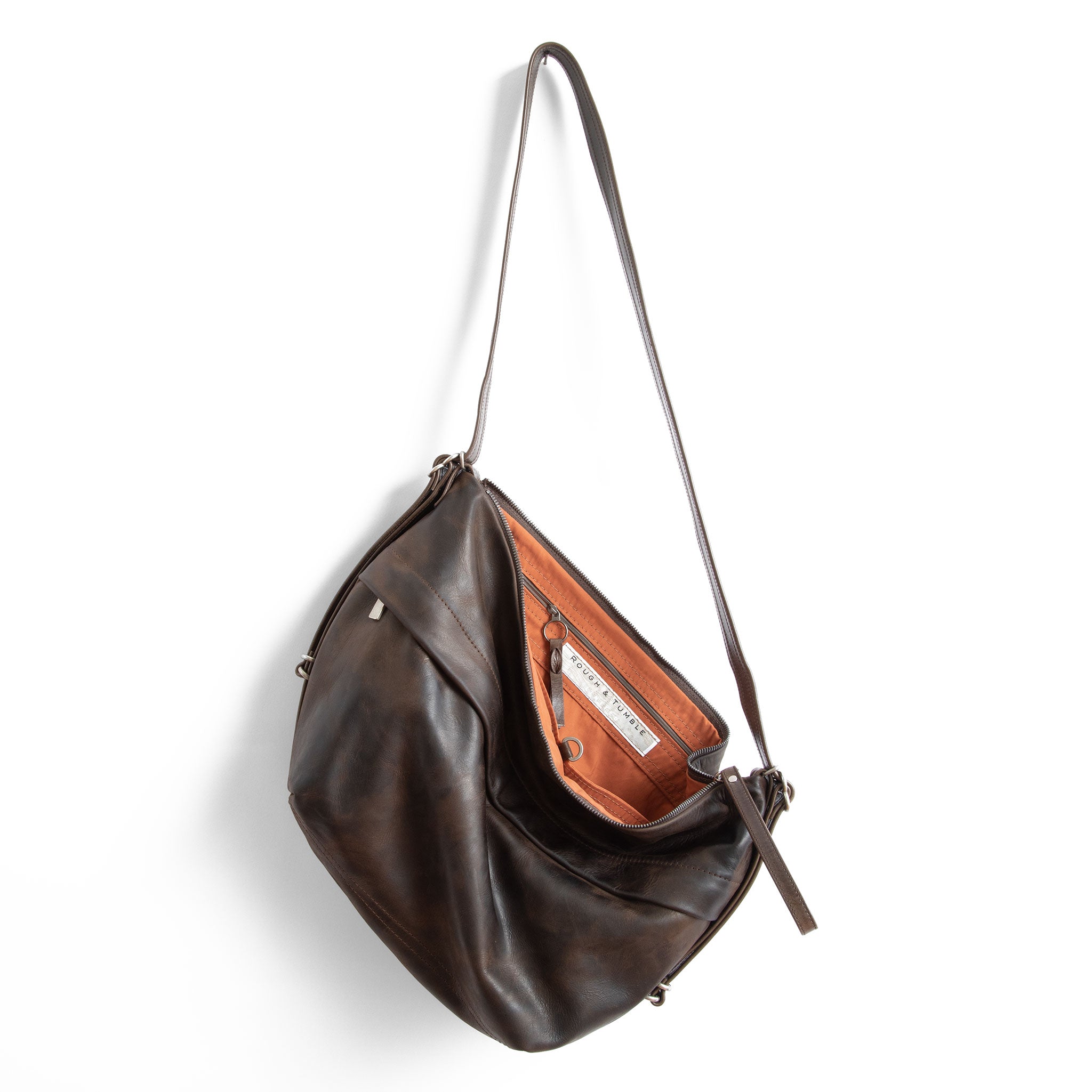 duffel single zip in distressed espresso, showcasing interior cider lining