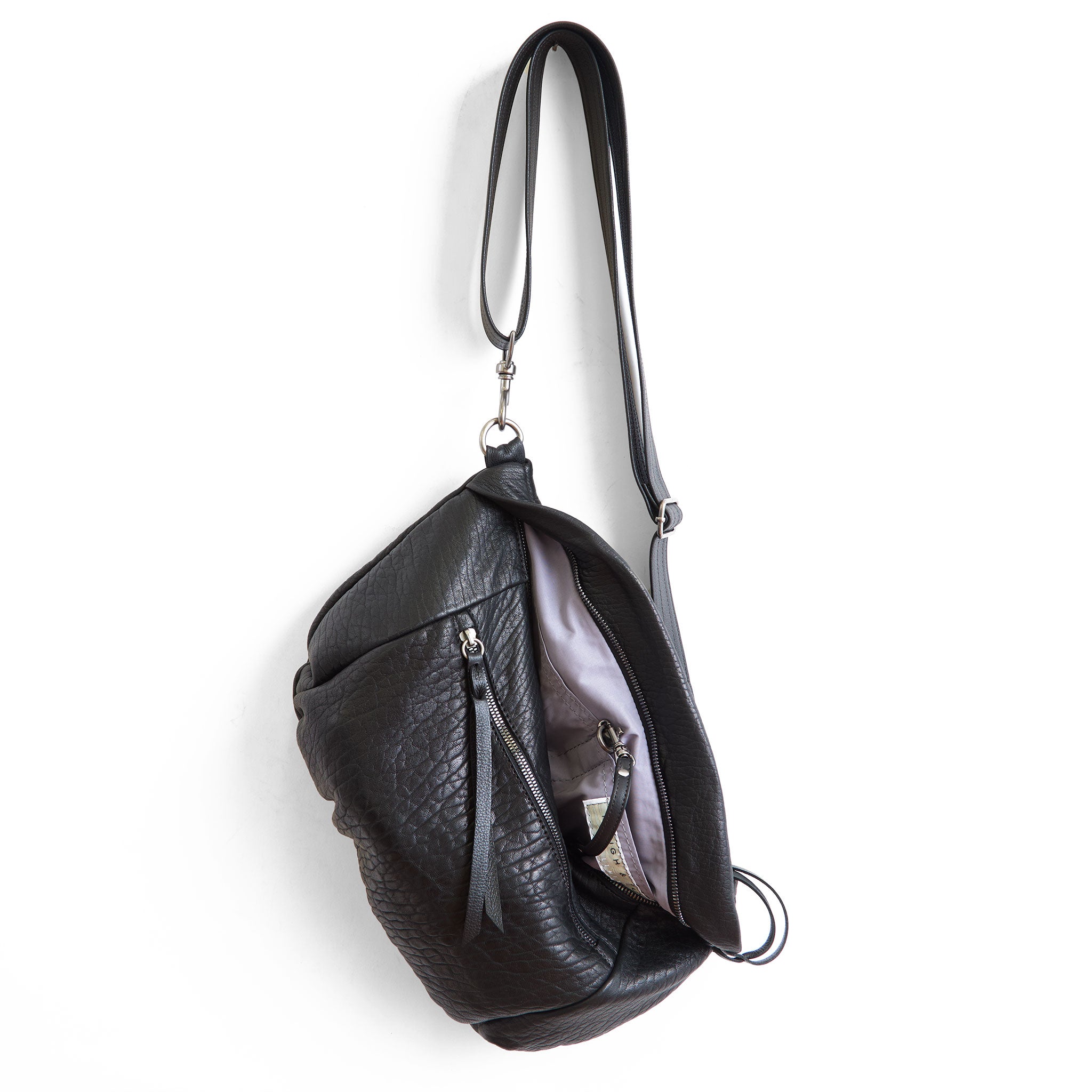 jenny size large in black pebble, showcasing interior lupine lining