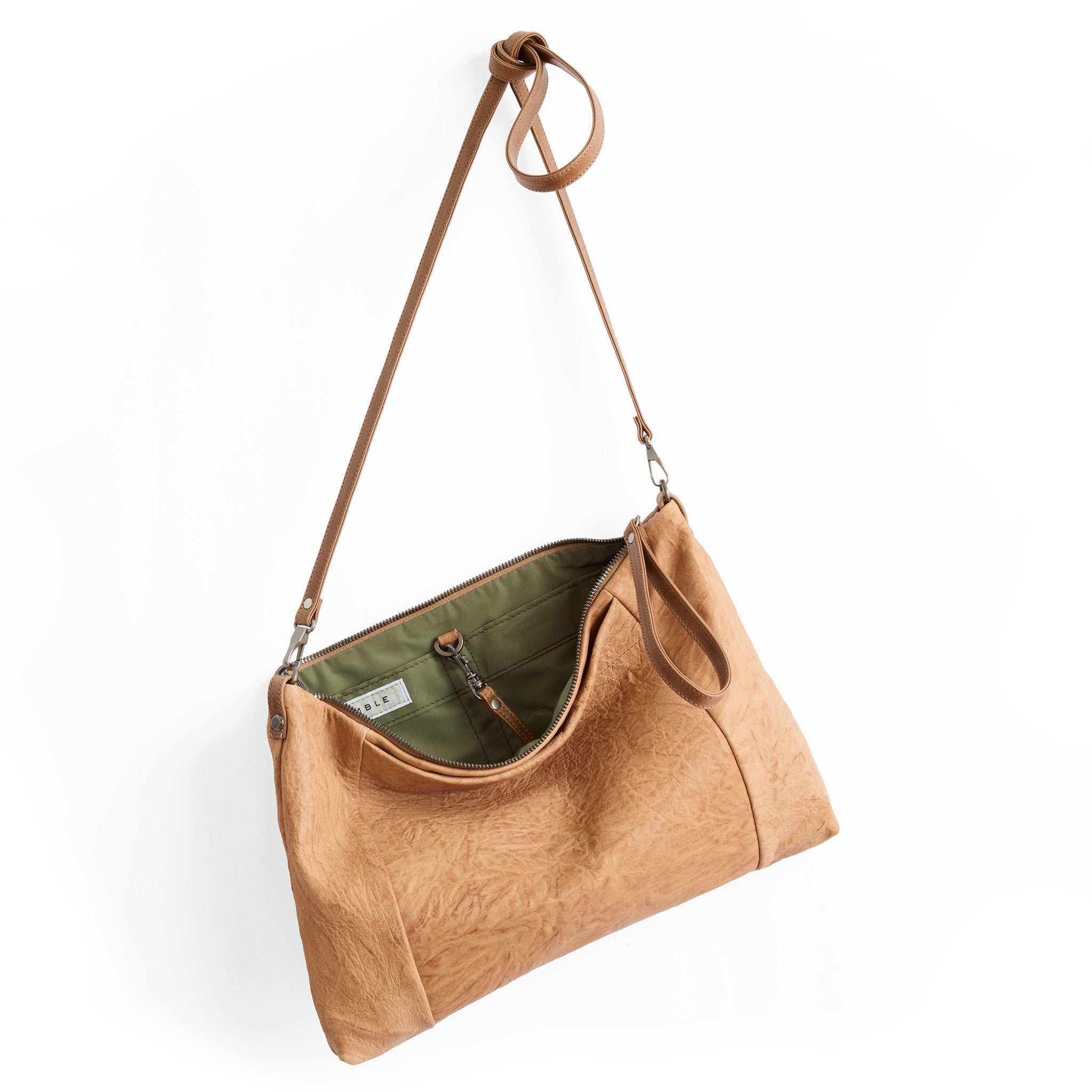 XL marsden in flight vachetta, showcasing interior sage lining