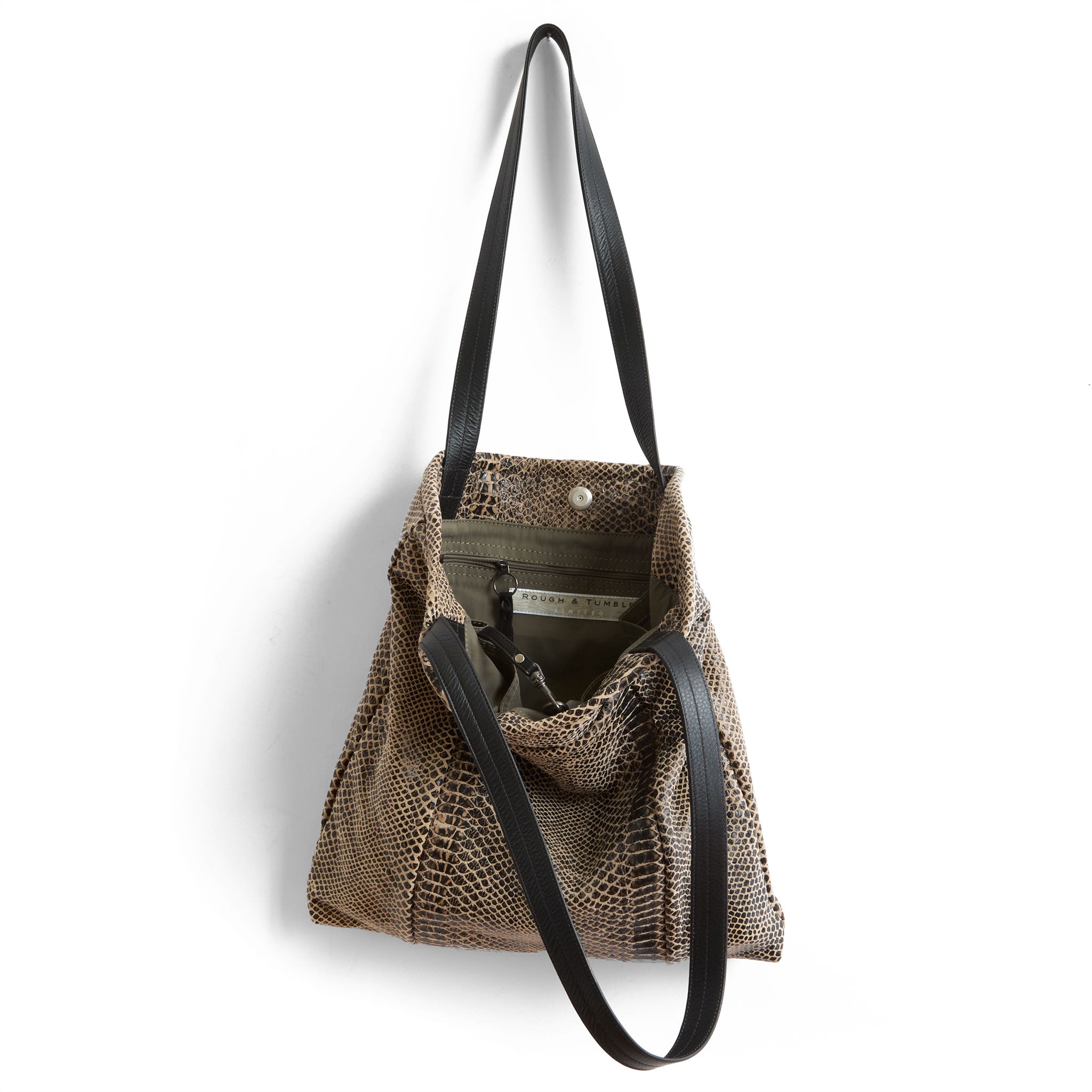 nina in destroyed soft snake, showcasing interior essex lining