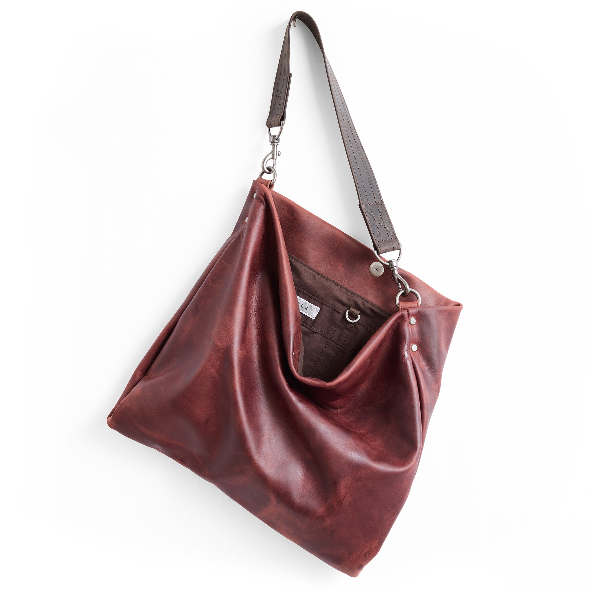 medium olivia in amaro, showcasing interior chestnut lining