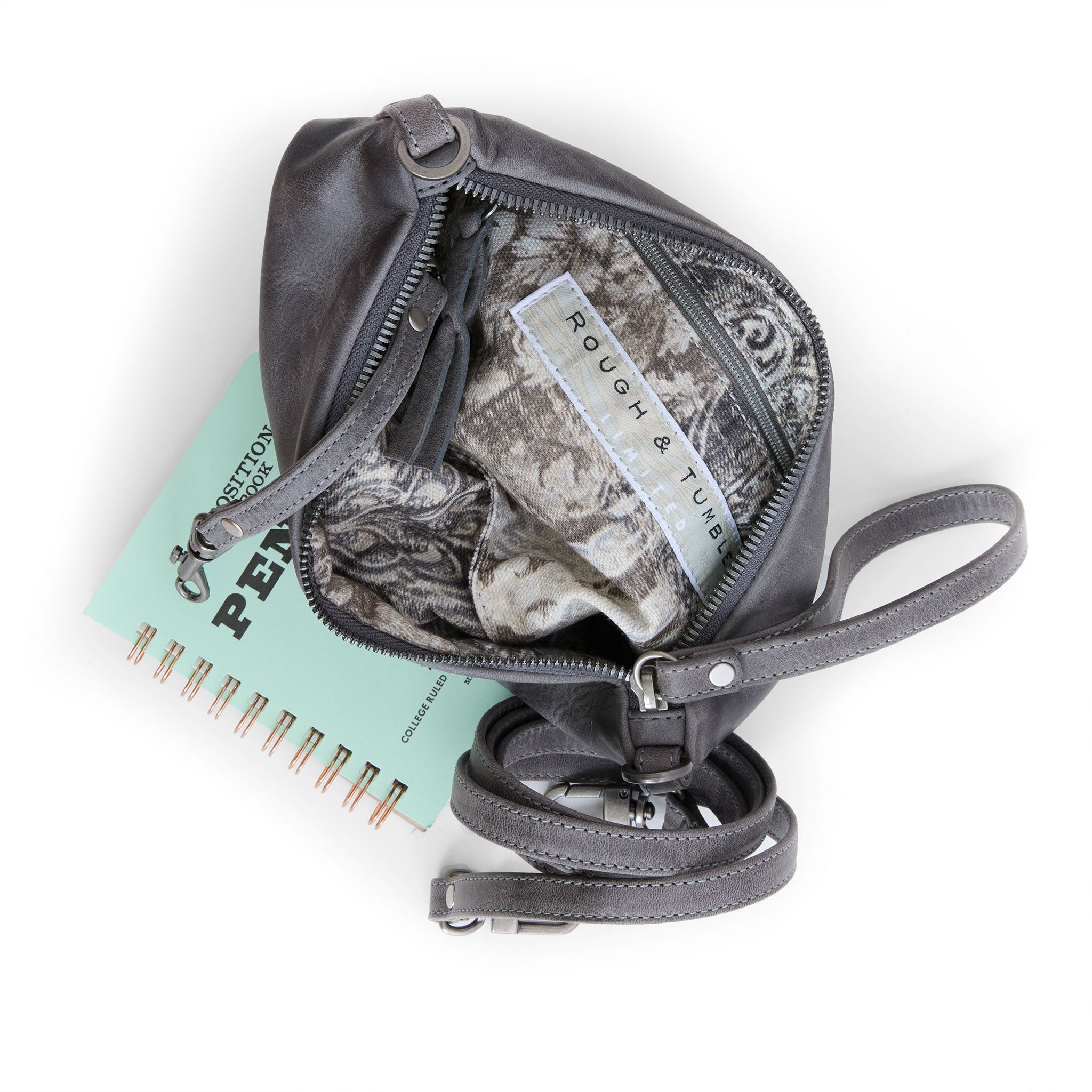 pinched bottom traveler in granite, showcasing interior kashmir lining