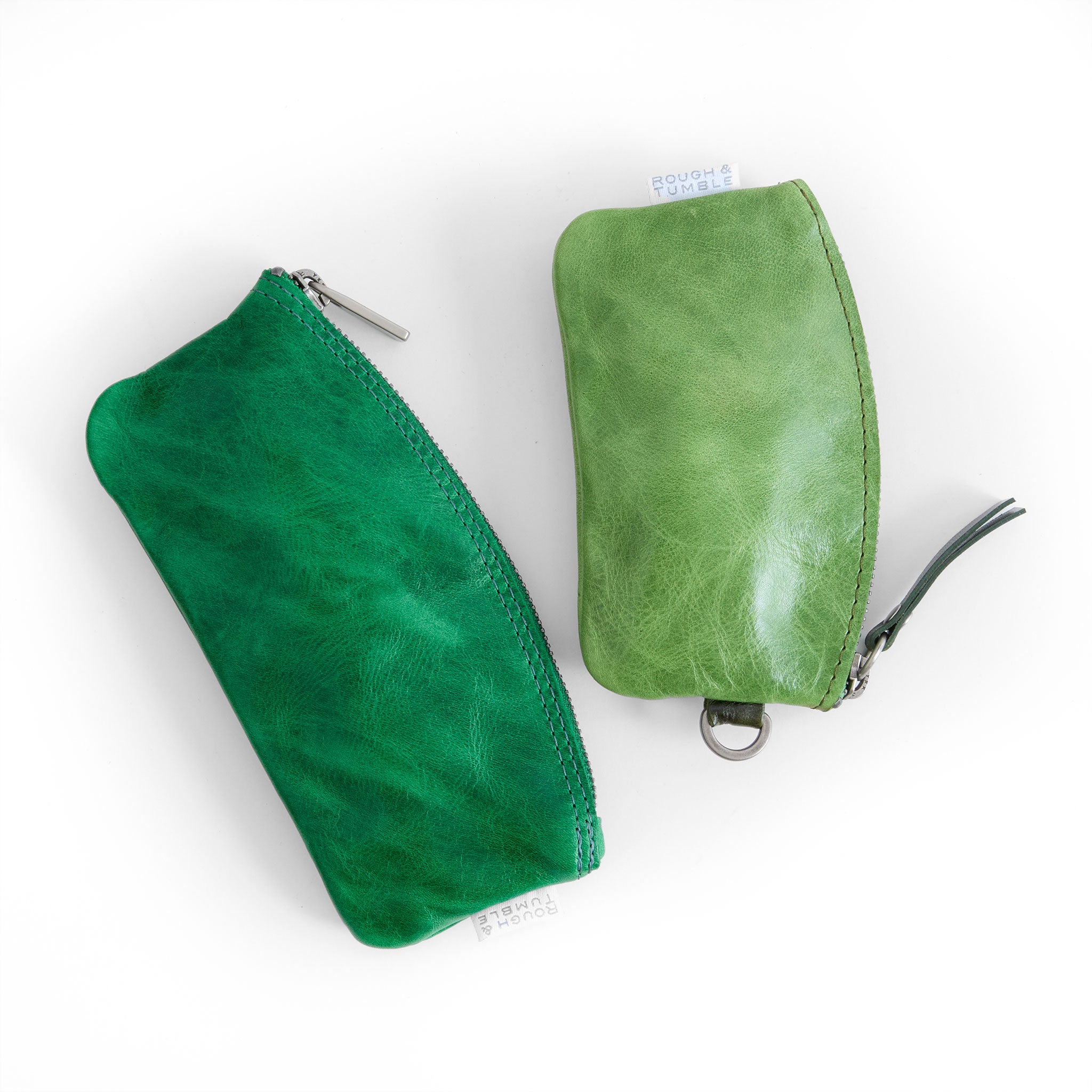 stylo in emerald next to token in sweet pea