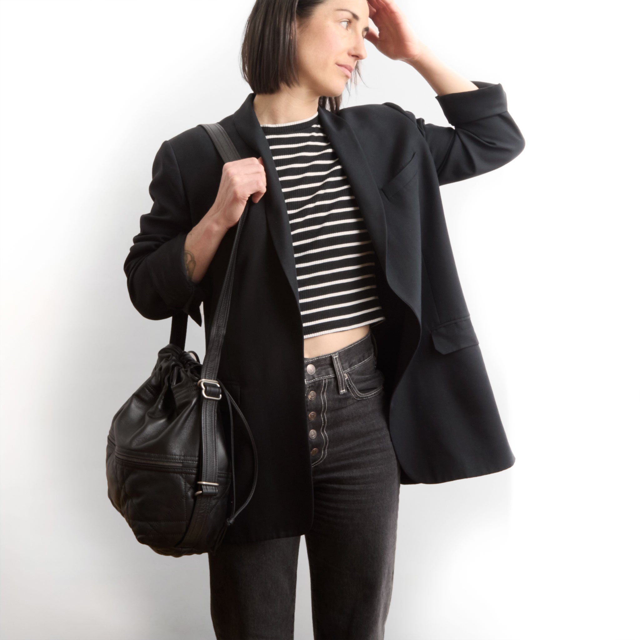 train sz size medium in quilted pashi black + plonge black being modeled