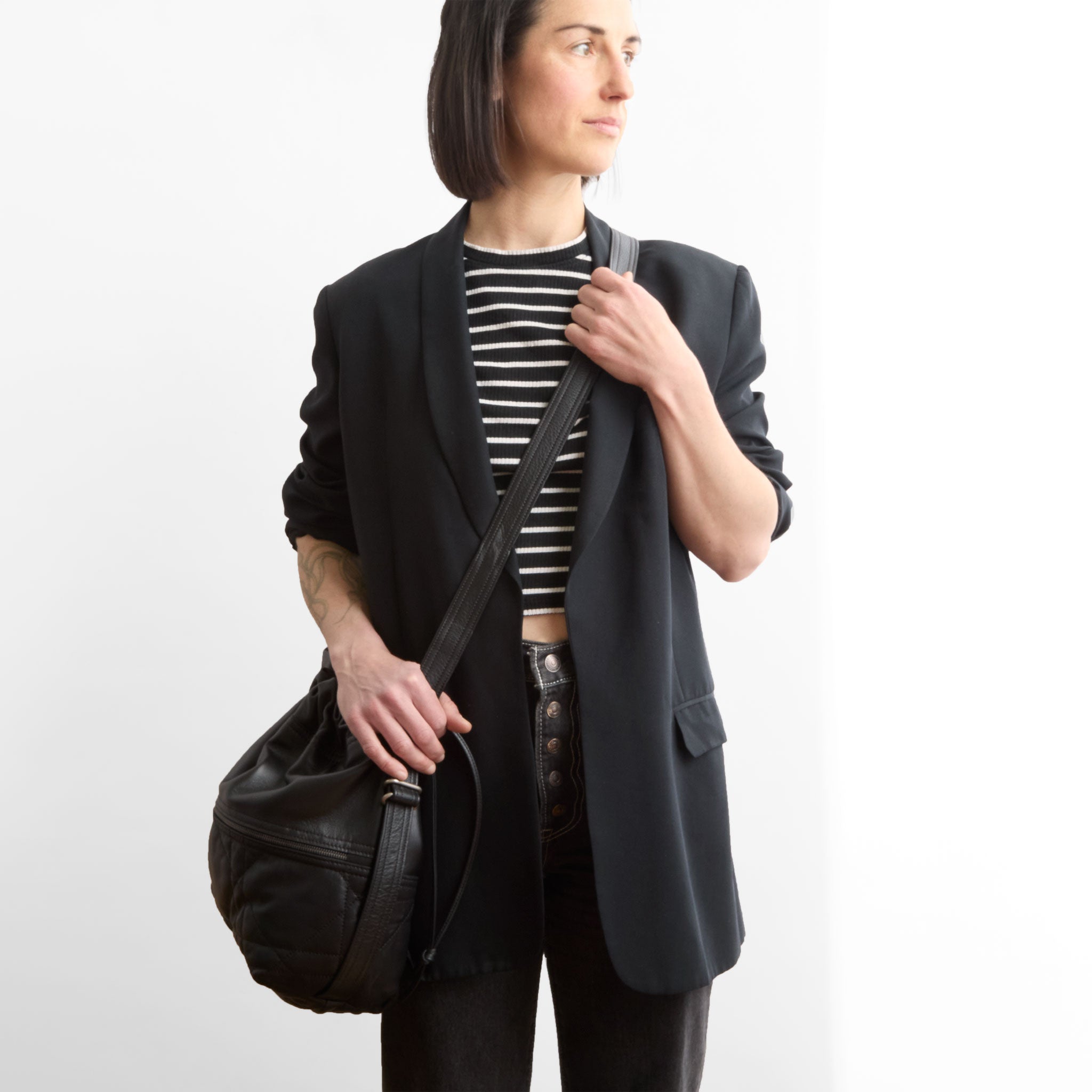 train sz size medium in quilted pashi black + plonge black being modeled