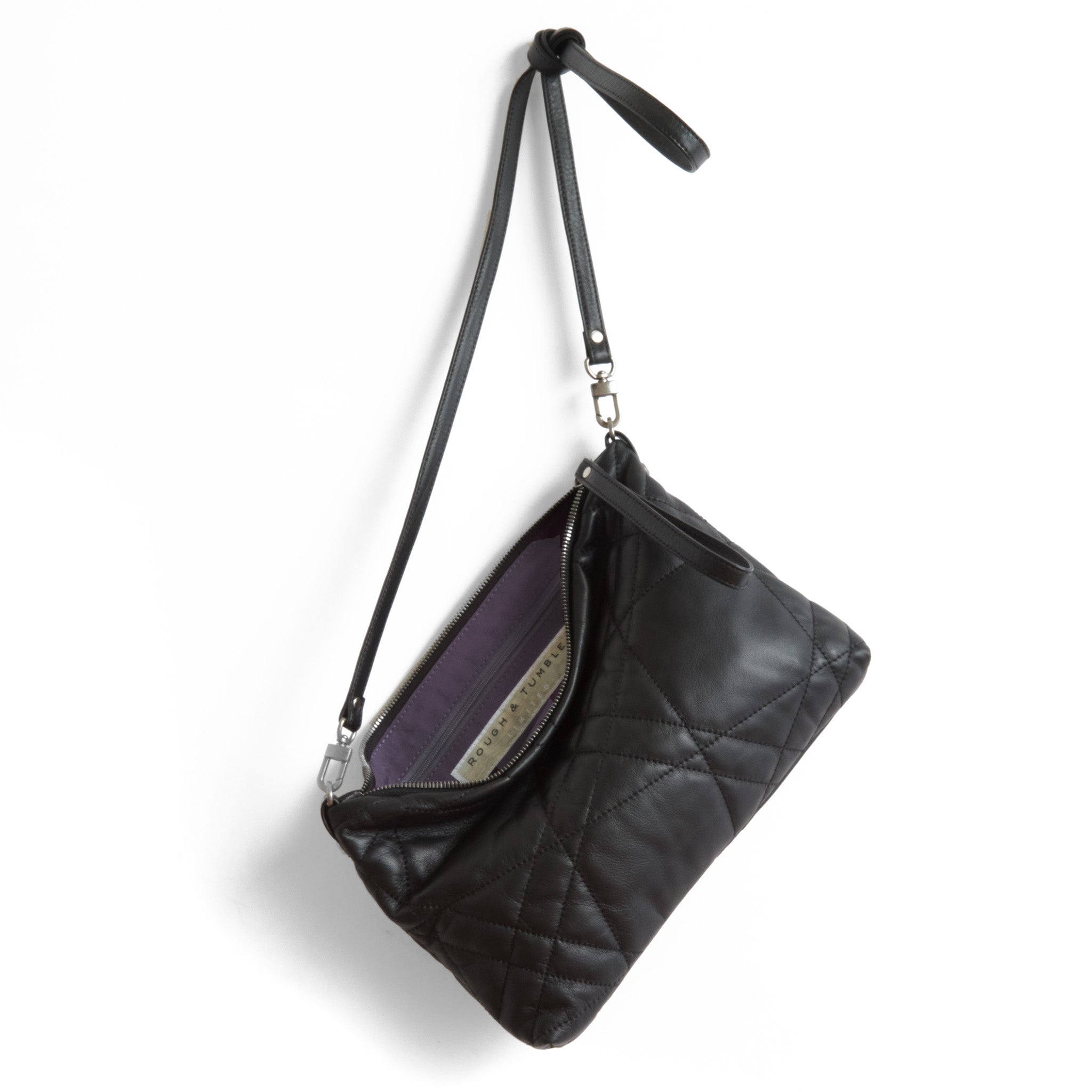 traveler in quilted pashi black, showcasing interior lupine lining and zippered interior pocket