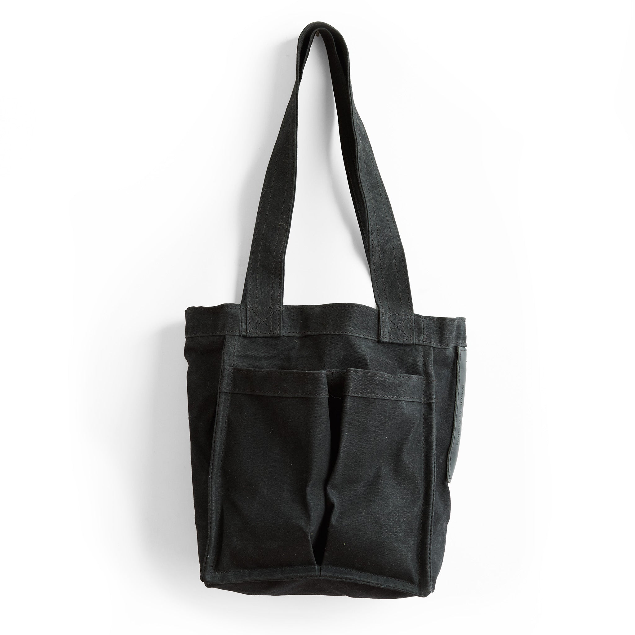 small treki in black waxed canvas