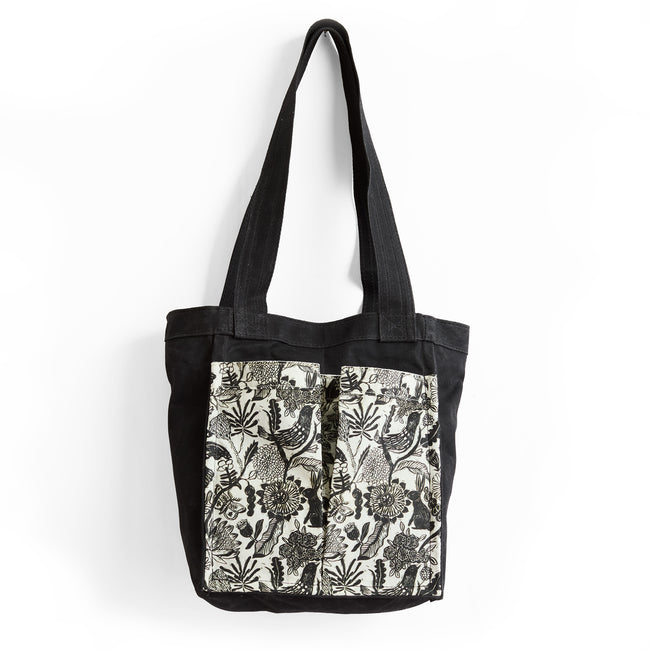 petite lapine + black | treki in black waxed canvas with petite lapine pockets