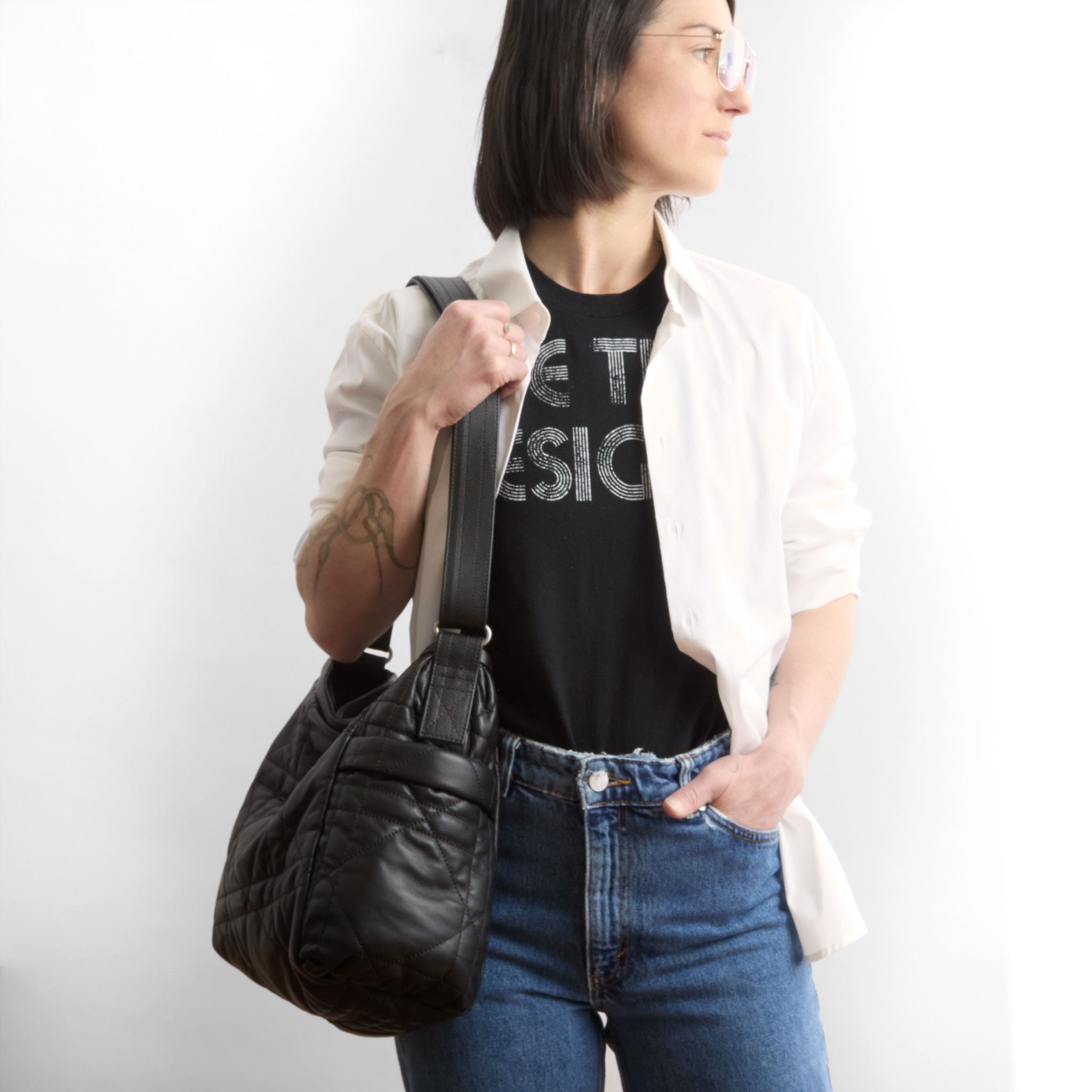 model wearing tulip size medium in quilted pashi black