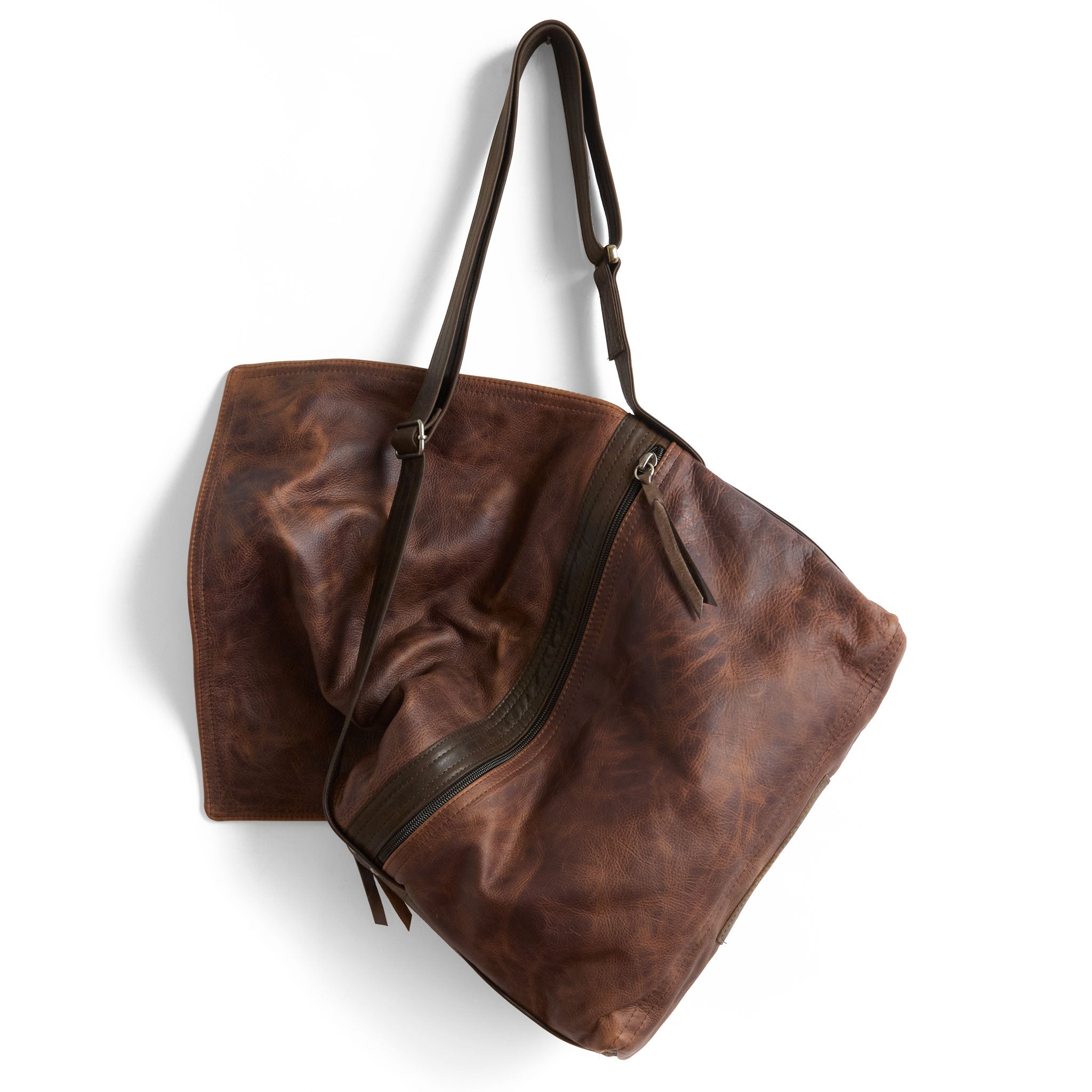 zip top messenger in fuentes, showcasing exterior zippered back pocket